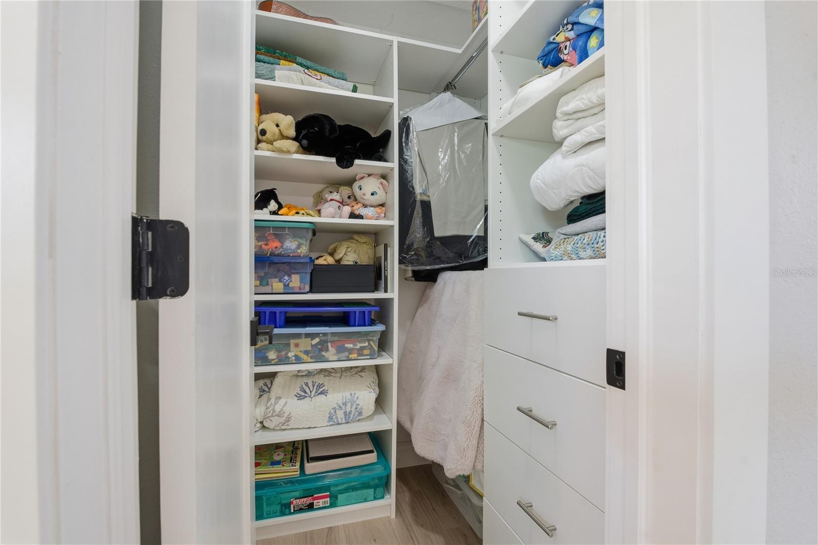 ANOTHER CUSTOM BUILT CLOSET! GREAT STORAGE IN THE BEDROOM WALK IN CLOSETS!