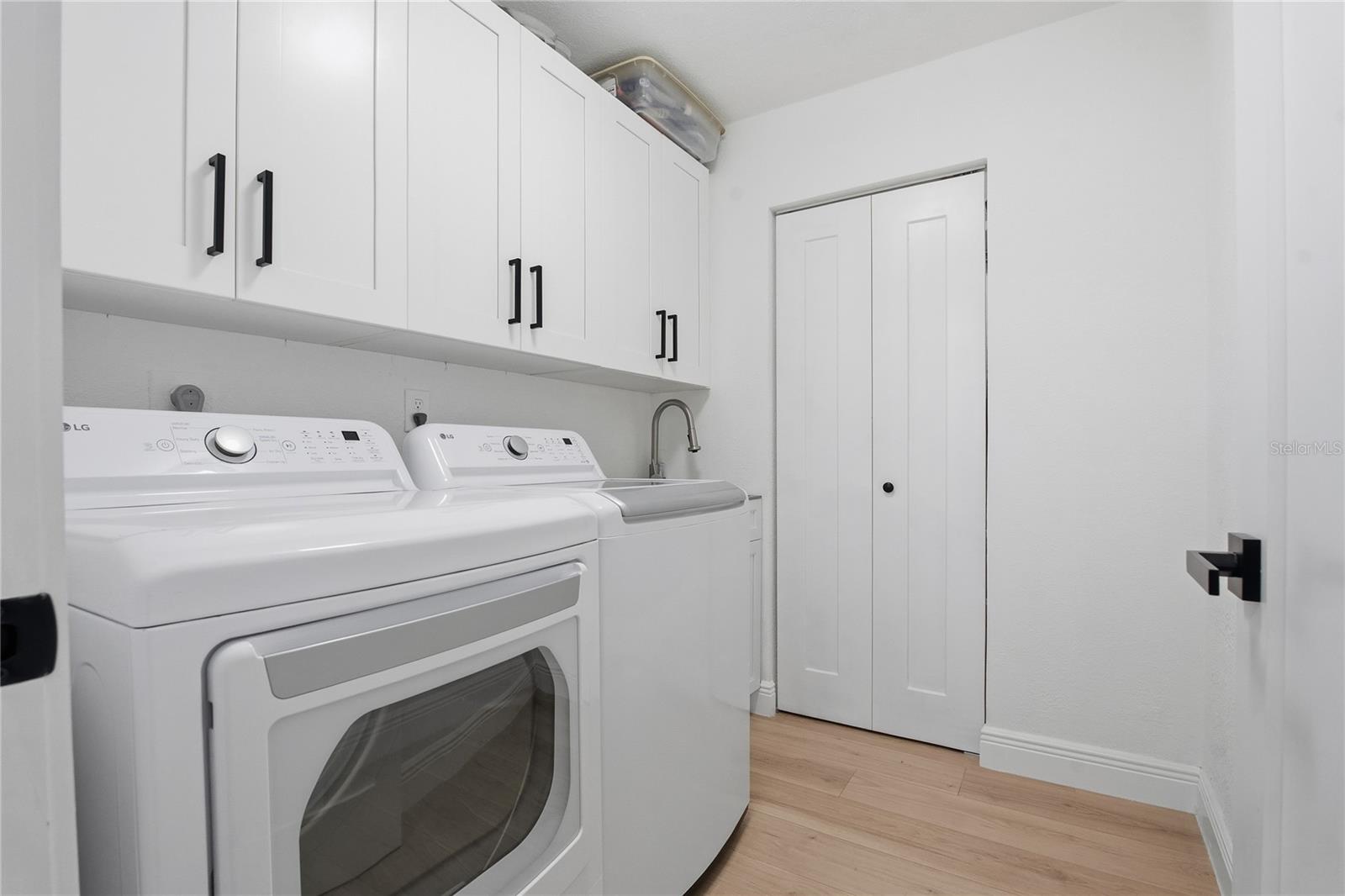 LAUNDRY ROOM WITH EXTRA UTILITY CLOSET!