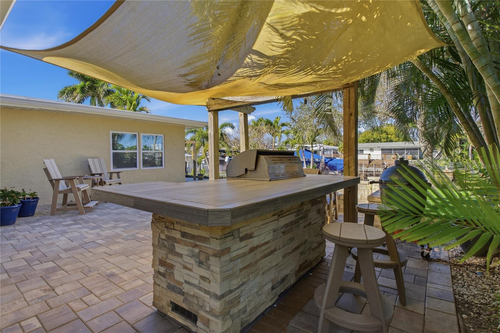 COVERED OUTDOOR KITCHEN AREA!