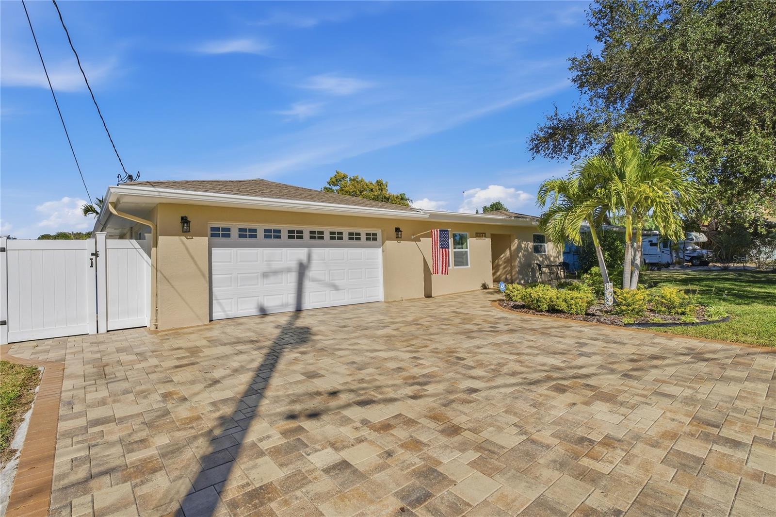 OVERSIZED BRICK-PAVER DRIVEWAY!