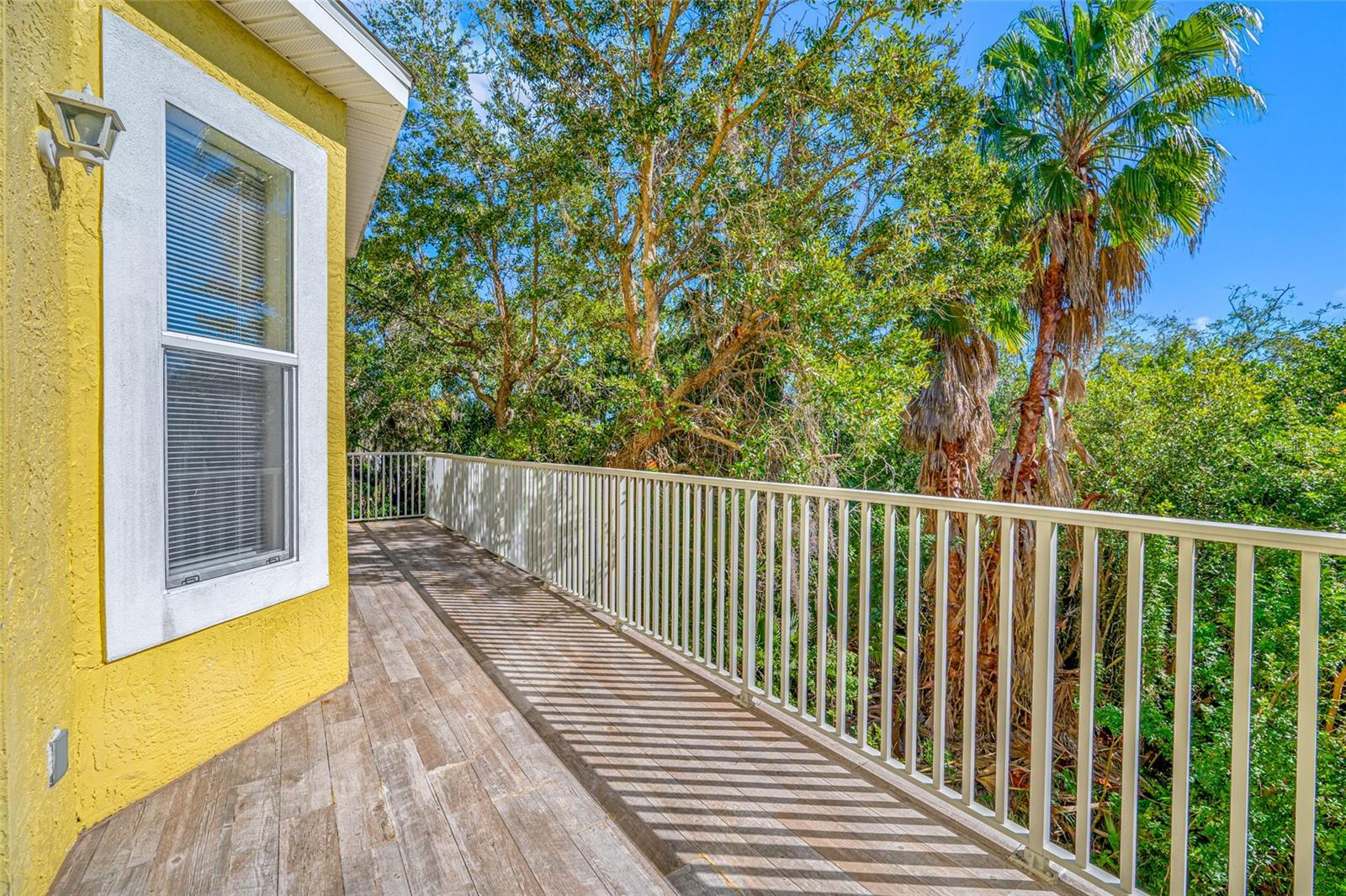 Spacious balcony overlooking green area