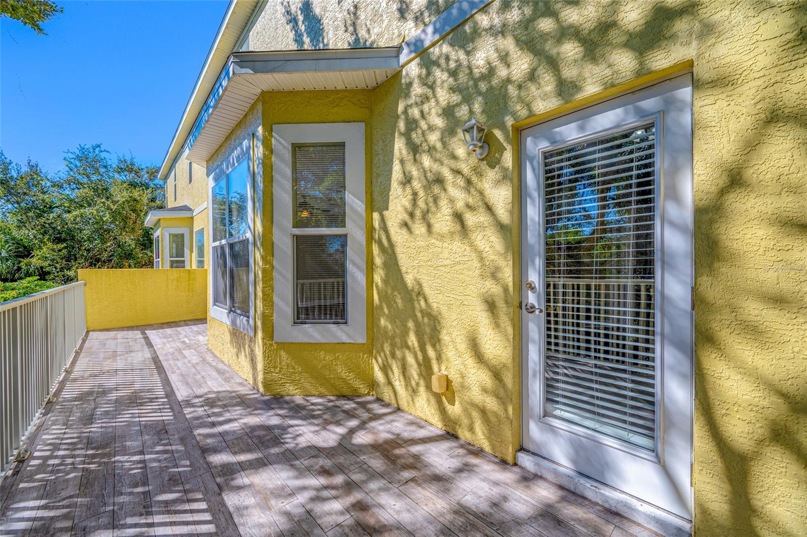 Also access the back deck from the third bedroom/office