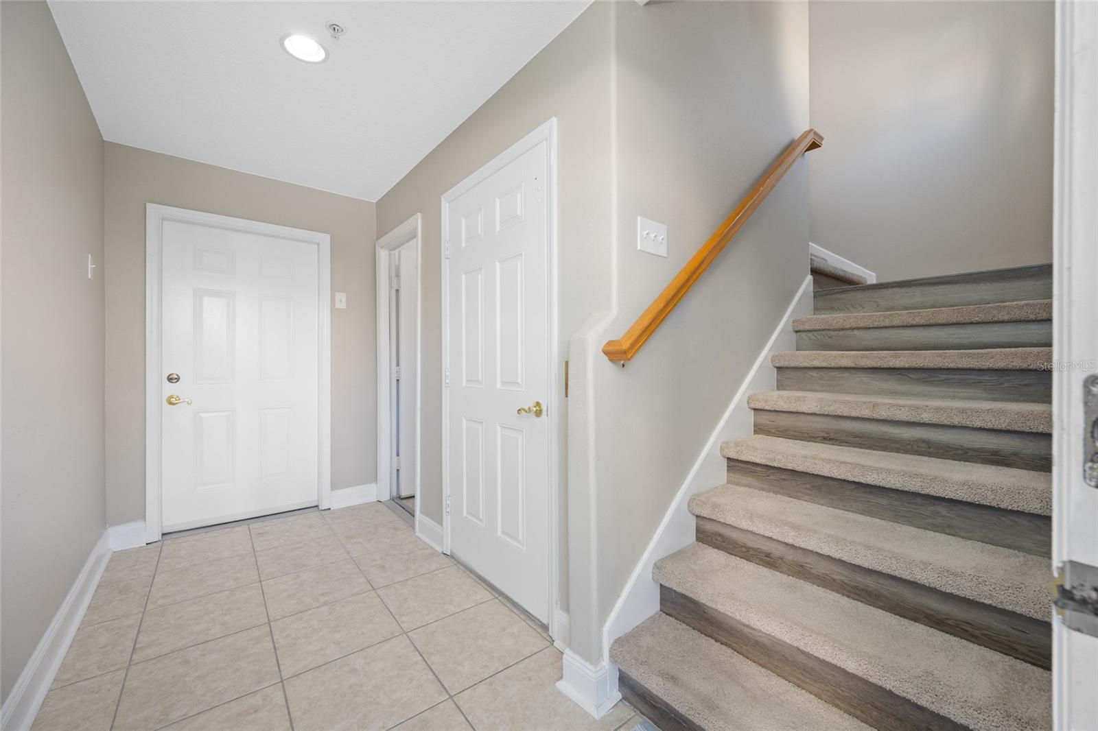 Front entry way with access to the stairs or use the convenient elevator