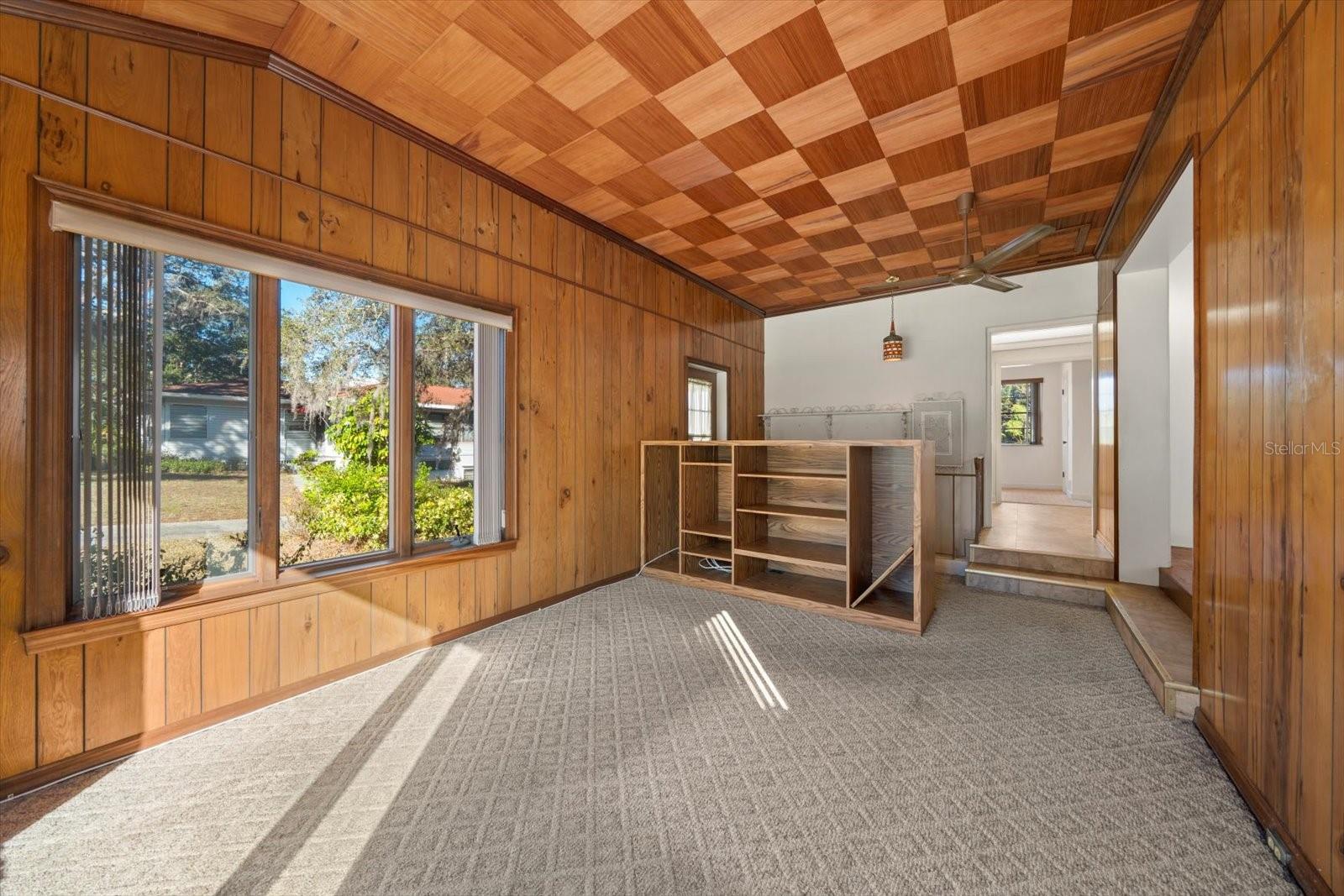 Family Room - showing entry to Kitchen and stairs to Lower Level