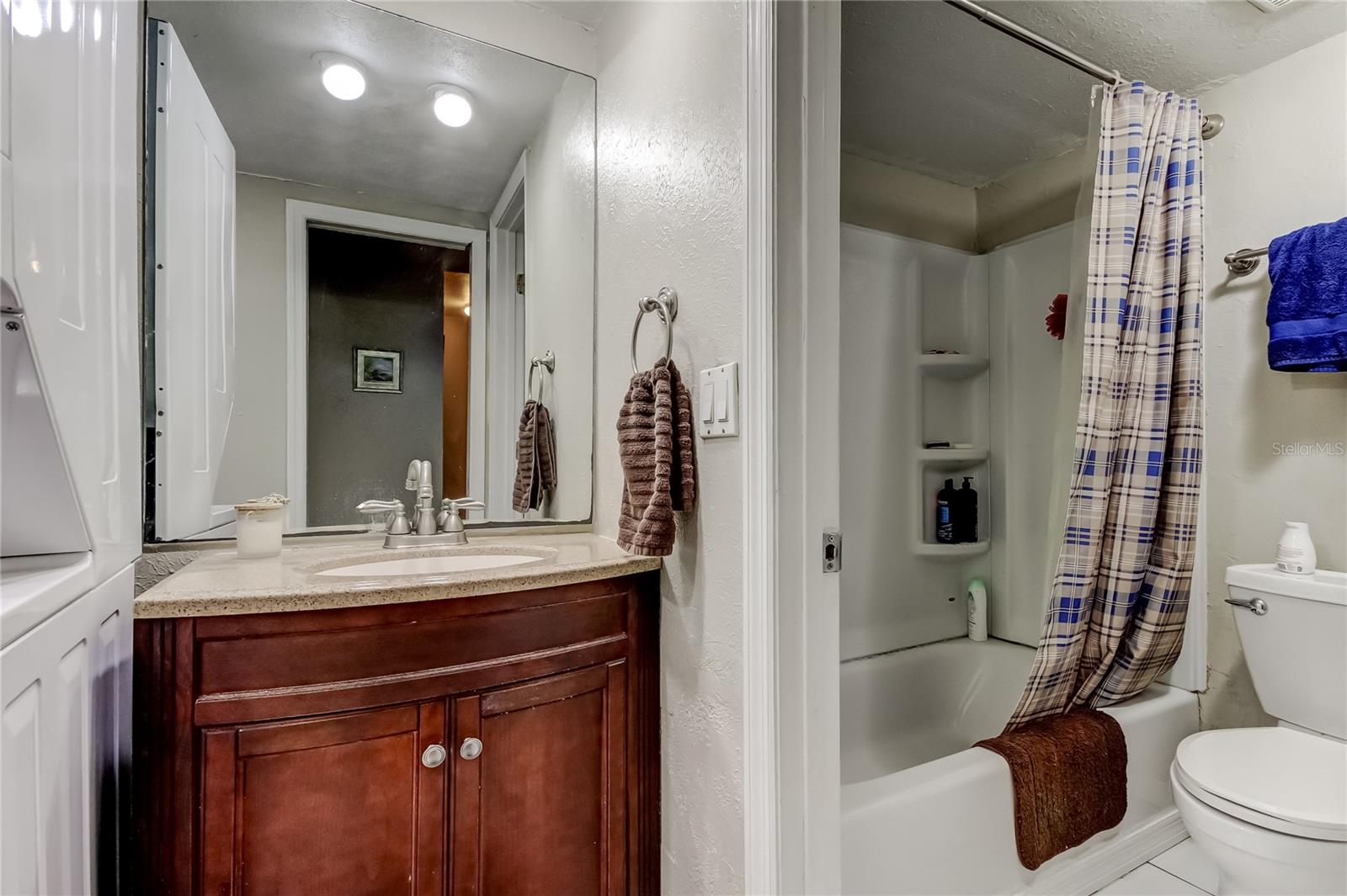 There is a door for water closet/shower privacy