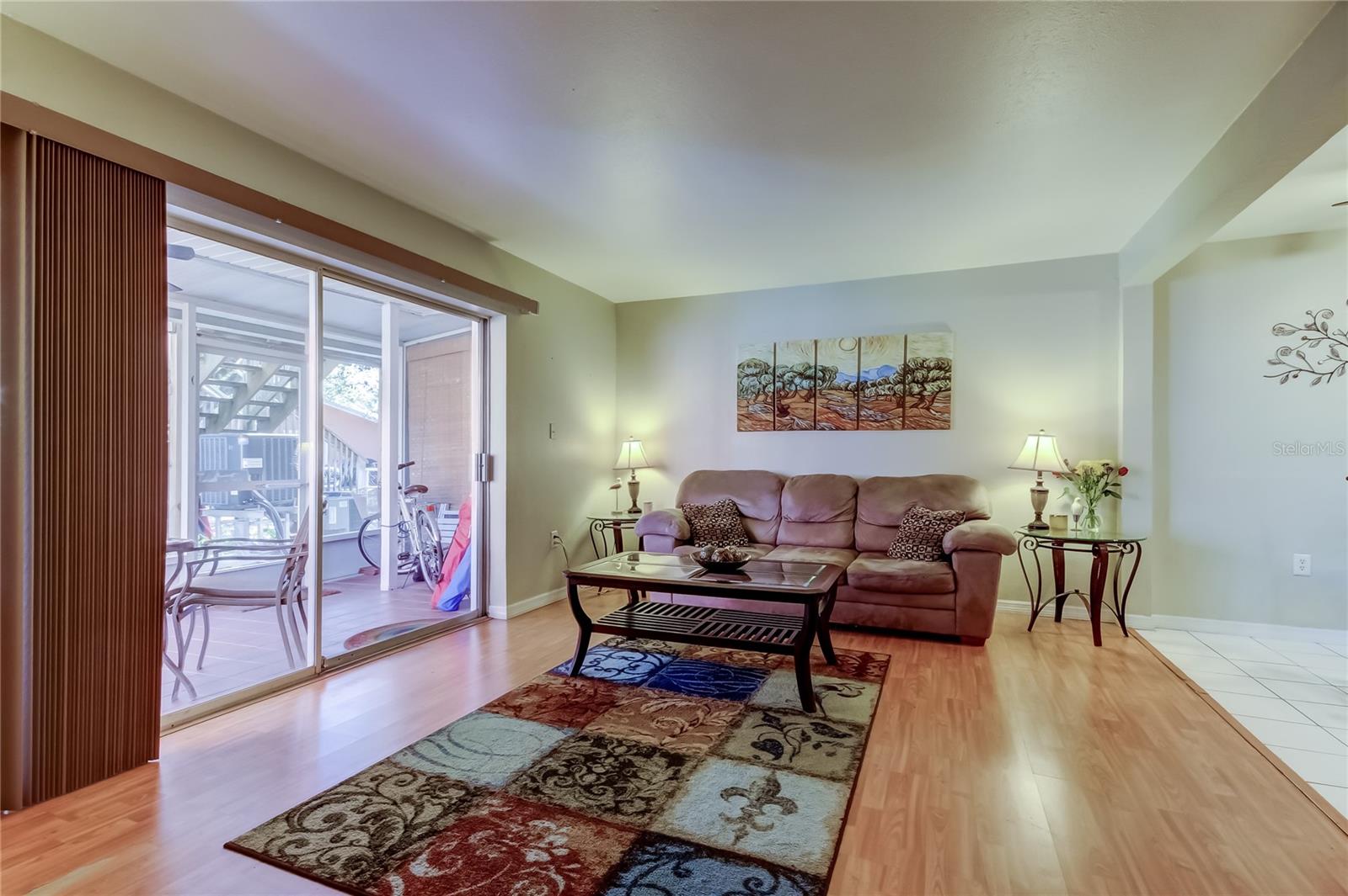 Large living area opening onto screened in lanai