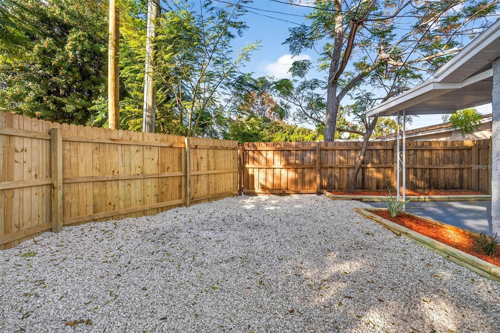 FULLY FENCED PRIVATE BACKYARD IS MAINTENANCE-FREE, BRAND NEW FENCE