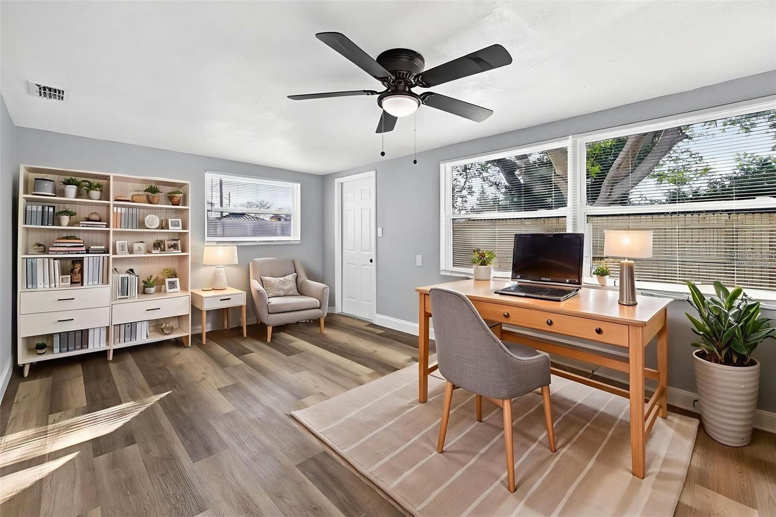 BEDROOM #3 WHICH CAN BE USED AS OFFICE, DEN OR PLAYROOM. IT HAS ACCESS TO THE BACKYARD *VIRTUALLY STAGED*