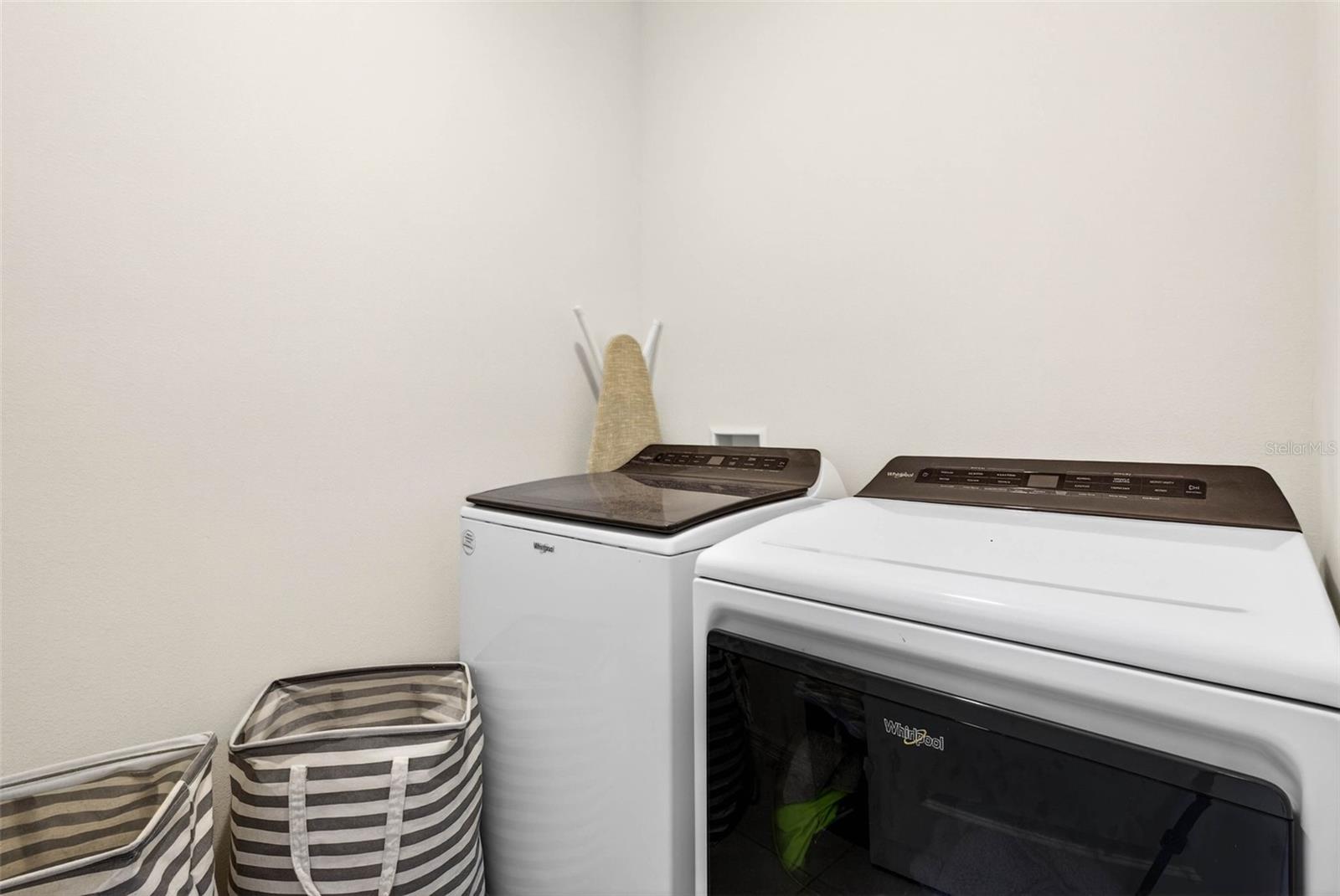 Laundry is on second floor with additional space to add cabinets/shelving.