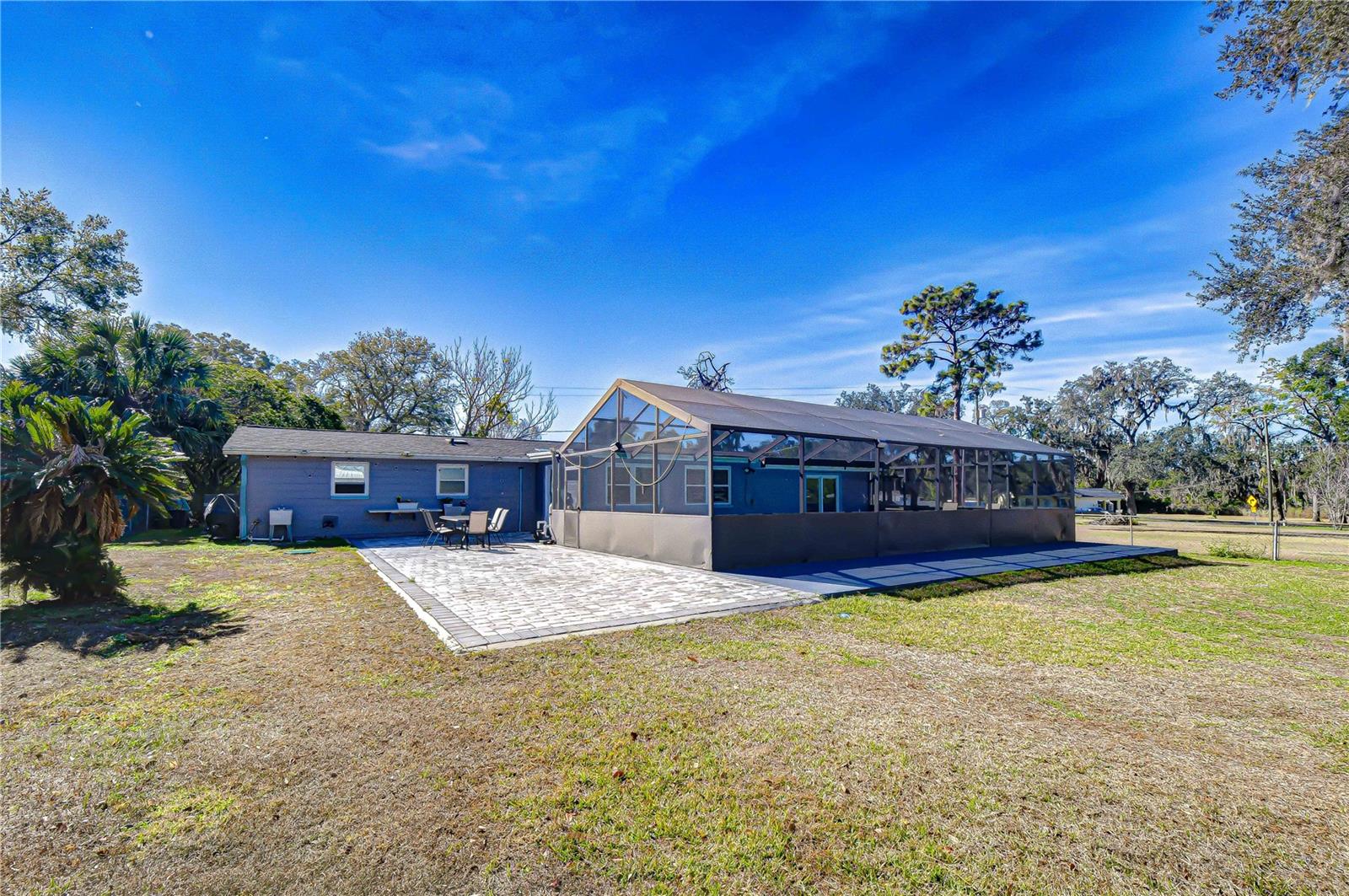 Pavered patio around the pool for extended entertaining space!