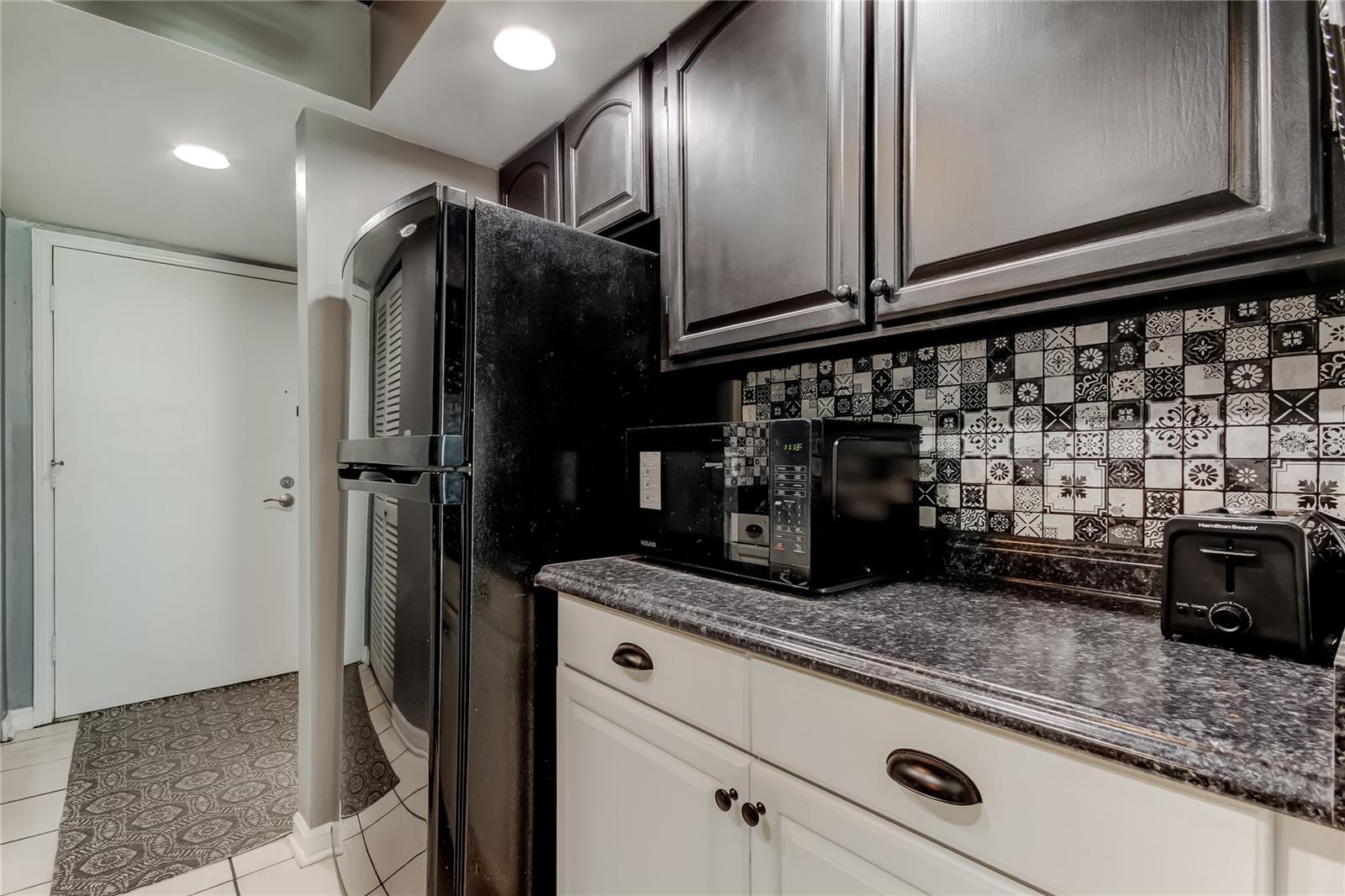 Lots of cabinet space in this Kitchen!