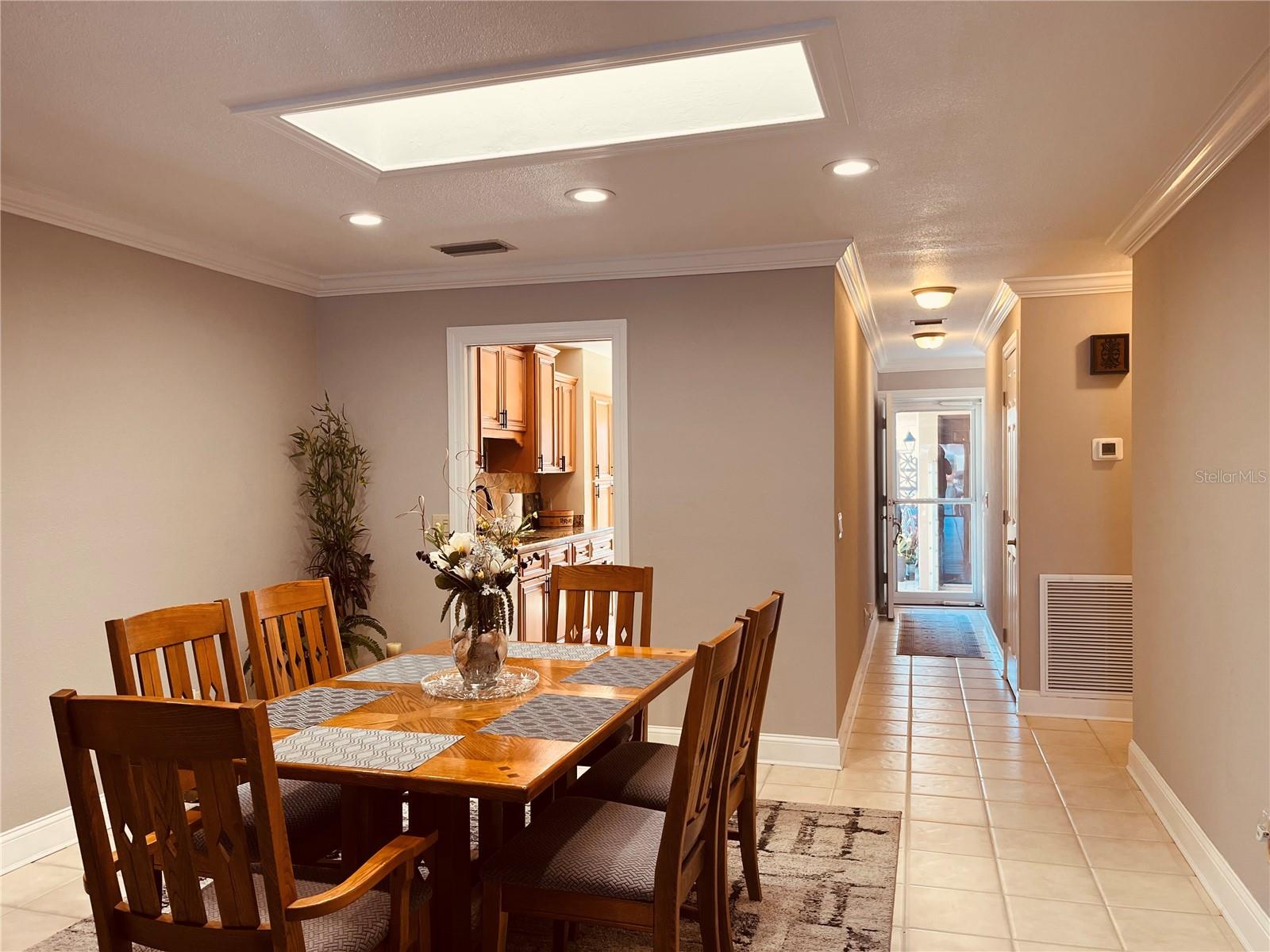 Standing center of the LR/DR combo, looking back to the front entrance and kitchen!