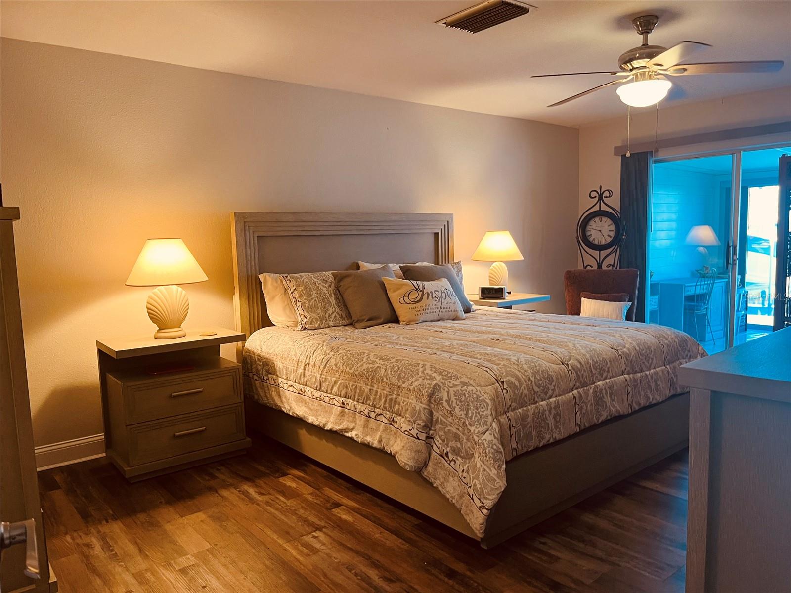 The primary bedroom has sliders to the Florida room and two large closet closets, including a walk-in!