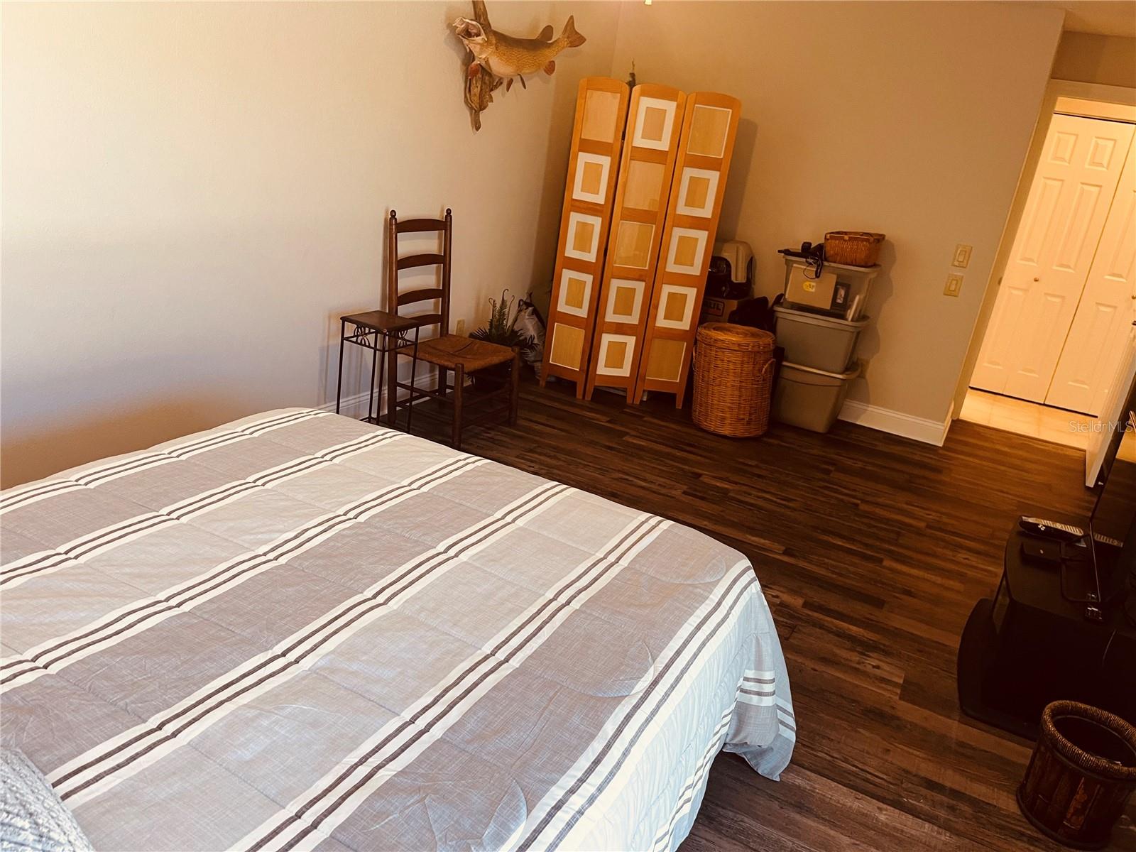 Another view of the second bedroom, standing beside the sliding doors that lead into your private courtyard!