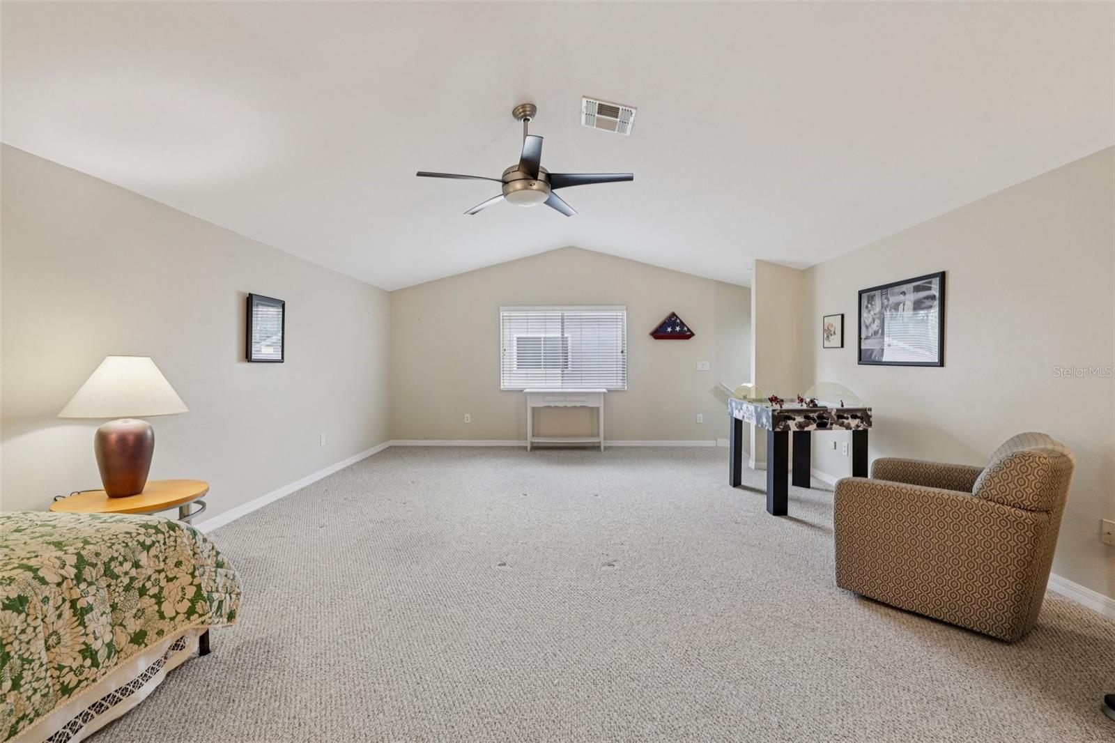 Giant Bonus room with separate bedroom and full bathroom.