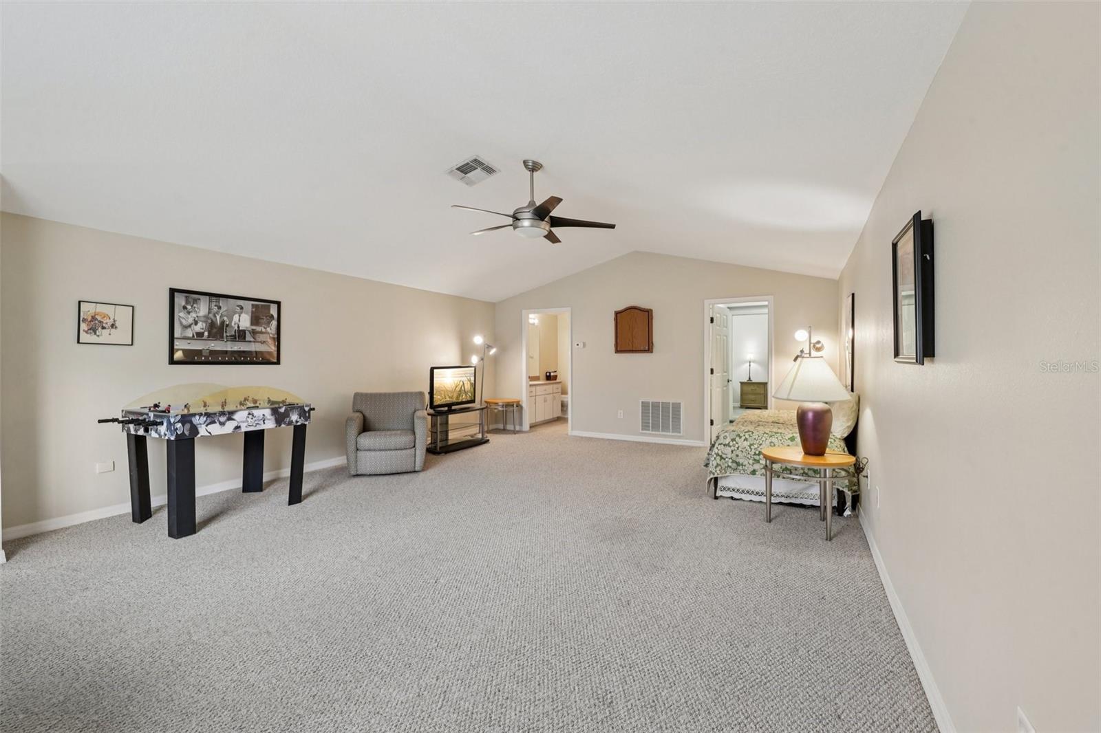 Giant Bonus room with separate bedroom and full bathroom.