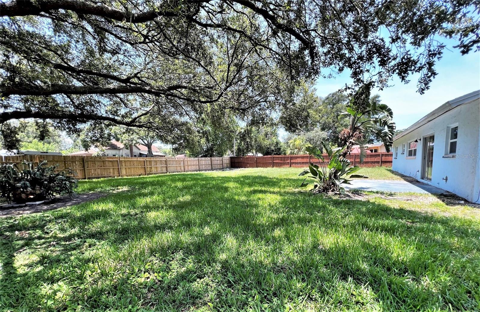 Large fully fenced, private and shaded backyard