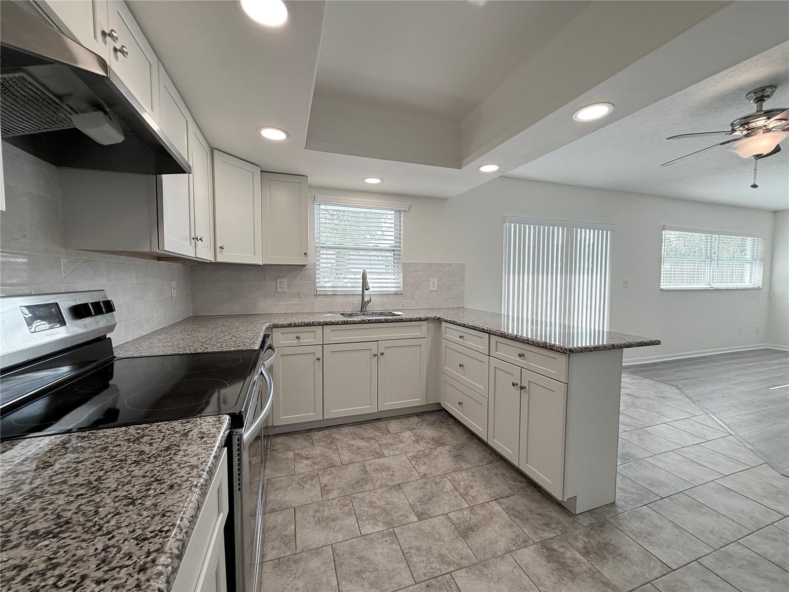 All windows and sliding glass door are insulated glass and hurricane impact strength