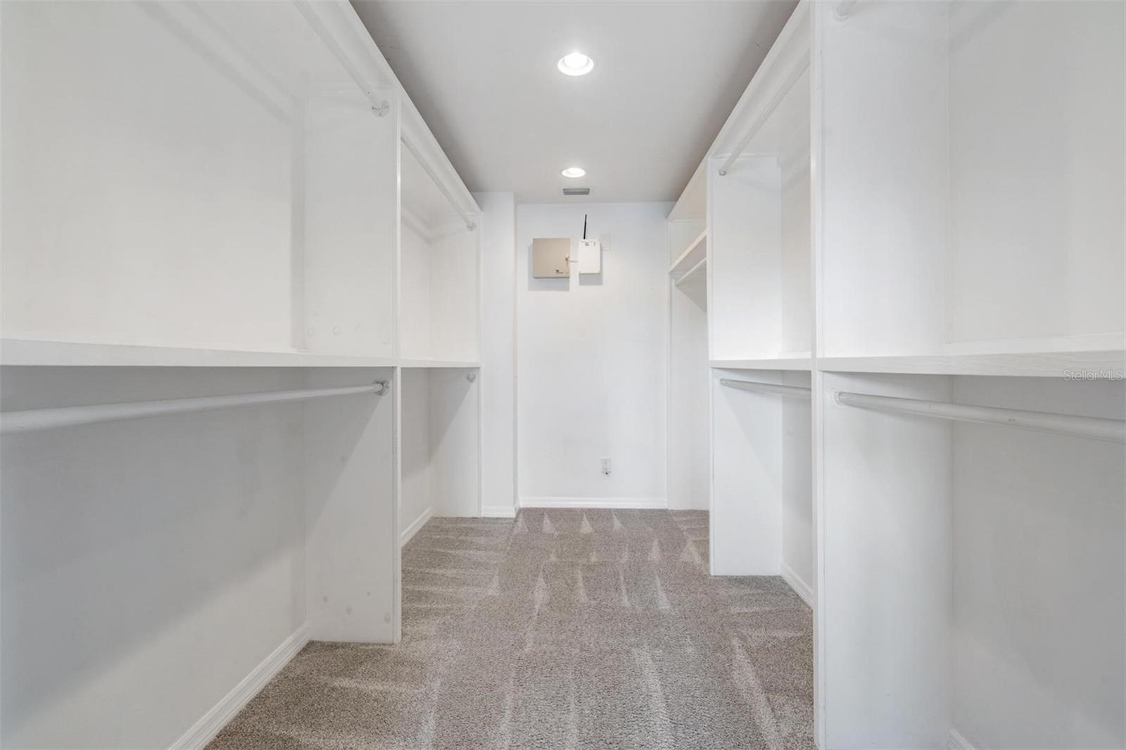 Primary bedroom large walk in closet