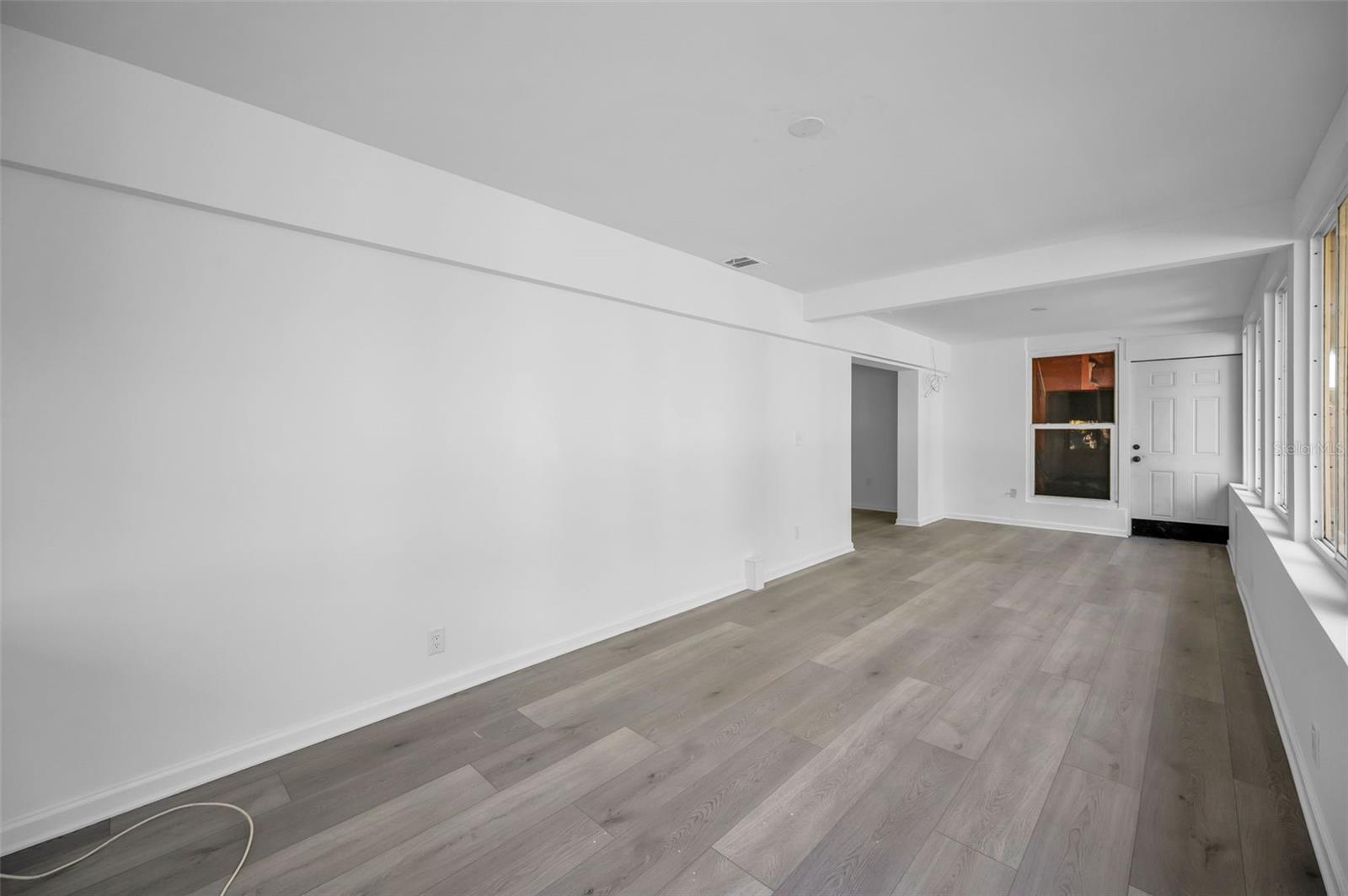 Bonus room leading to yard & pool area