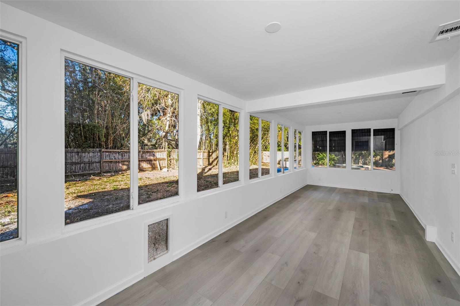 Bonus room leading to yard & pool area