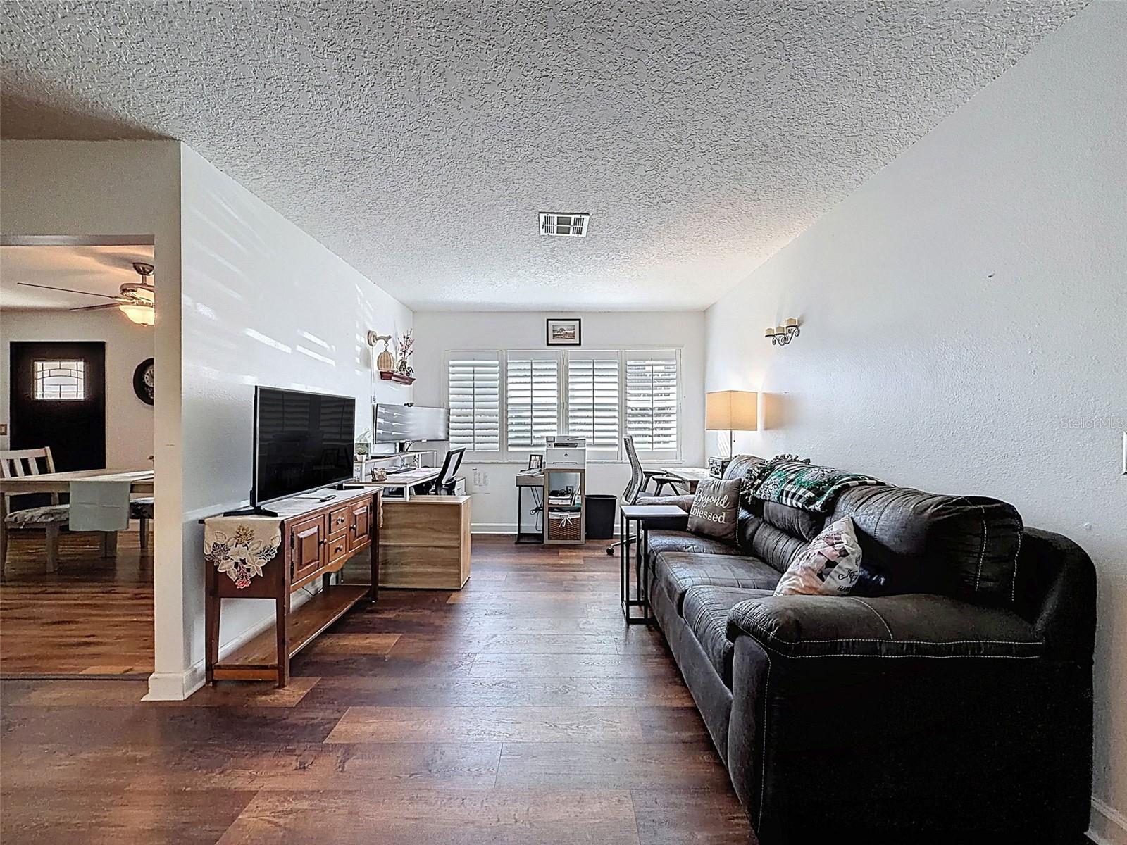 Family Room would make an easy 3rd bedroom!