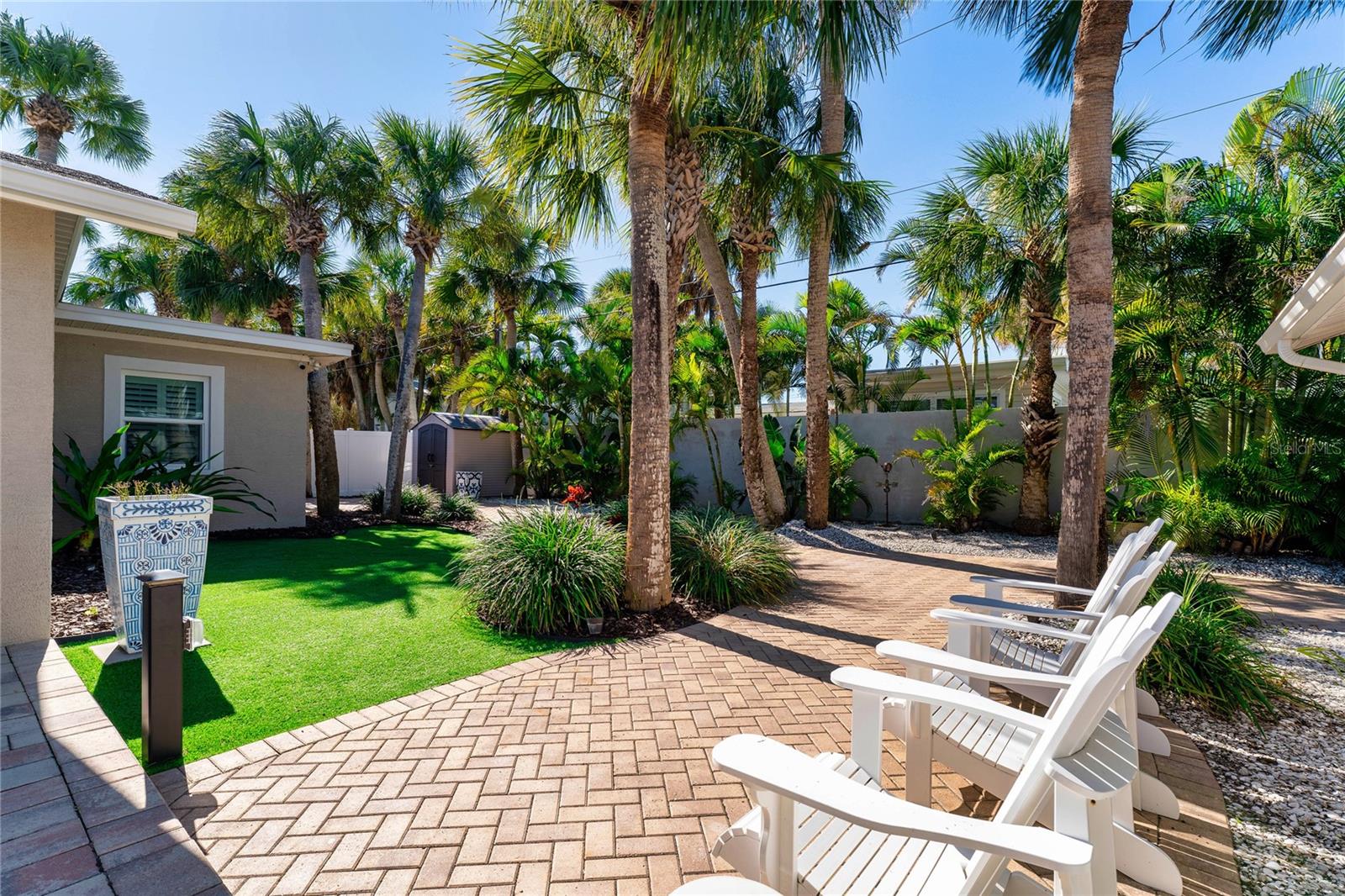 Backyard views showcase the various private exterior access and seating area.