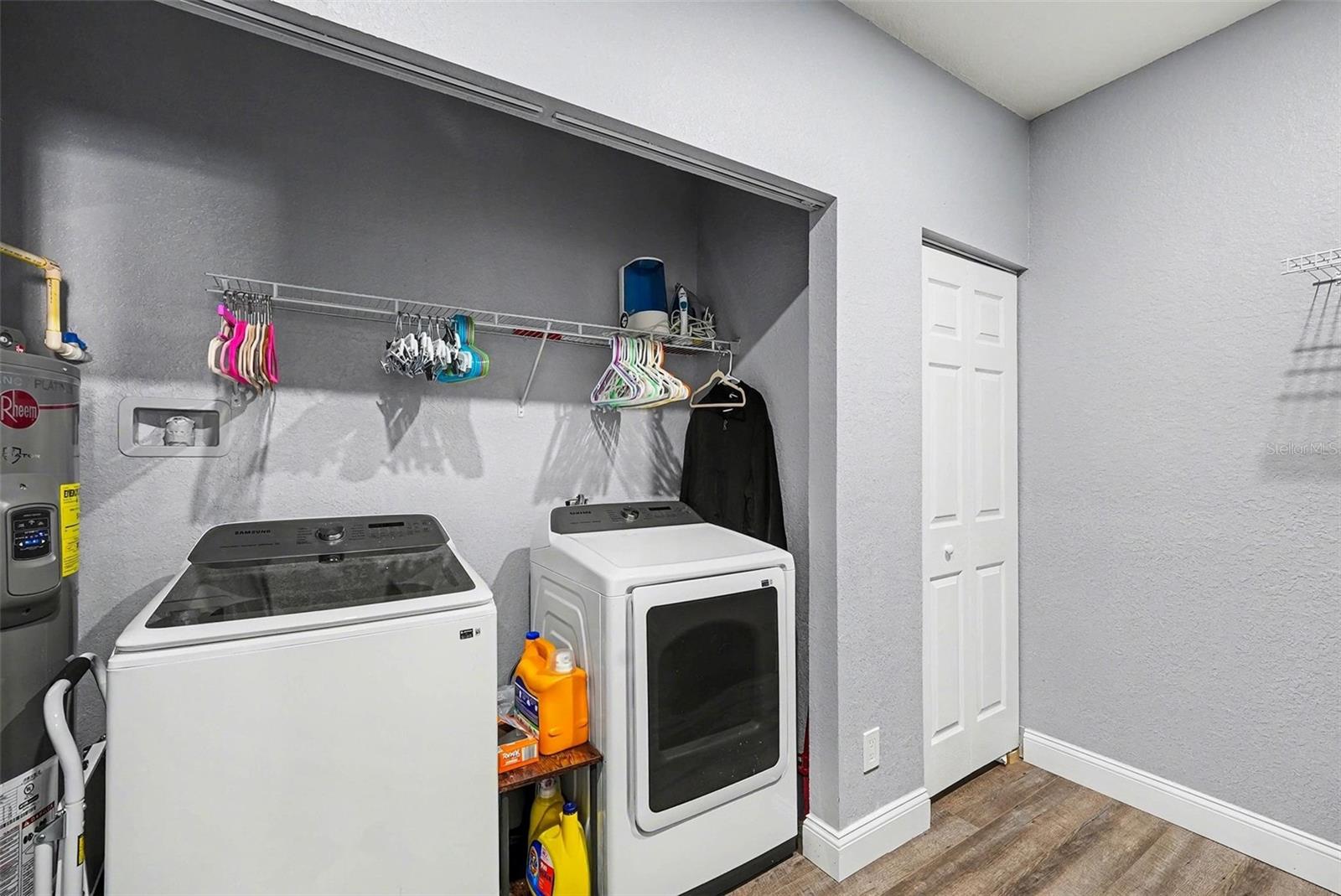 Large laundry with a closet and space for an additional desk, if you like