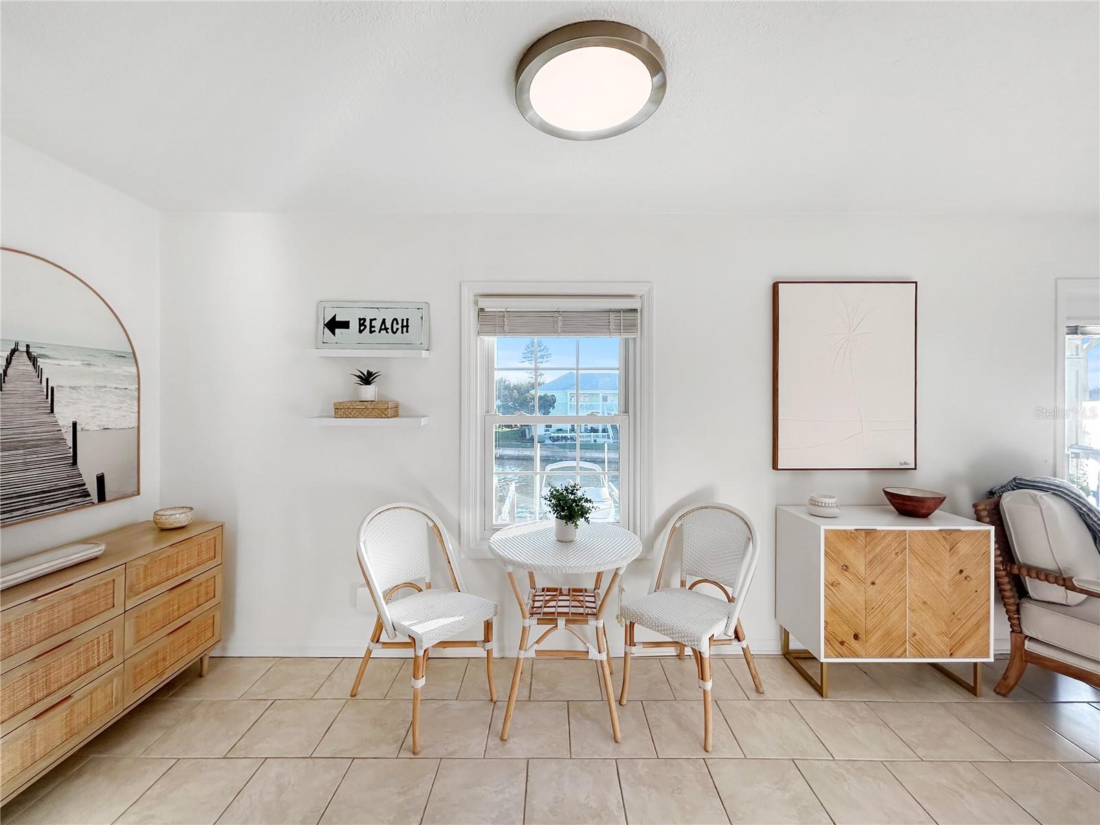 Dinette off kitchen overlooking waterway