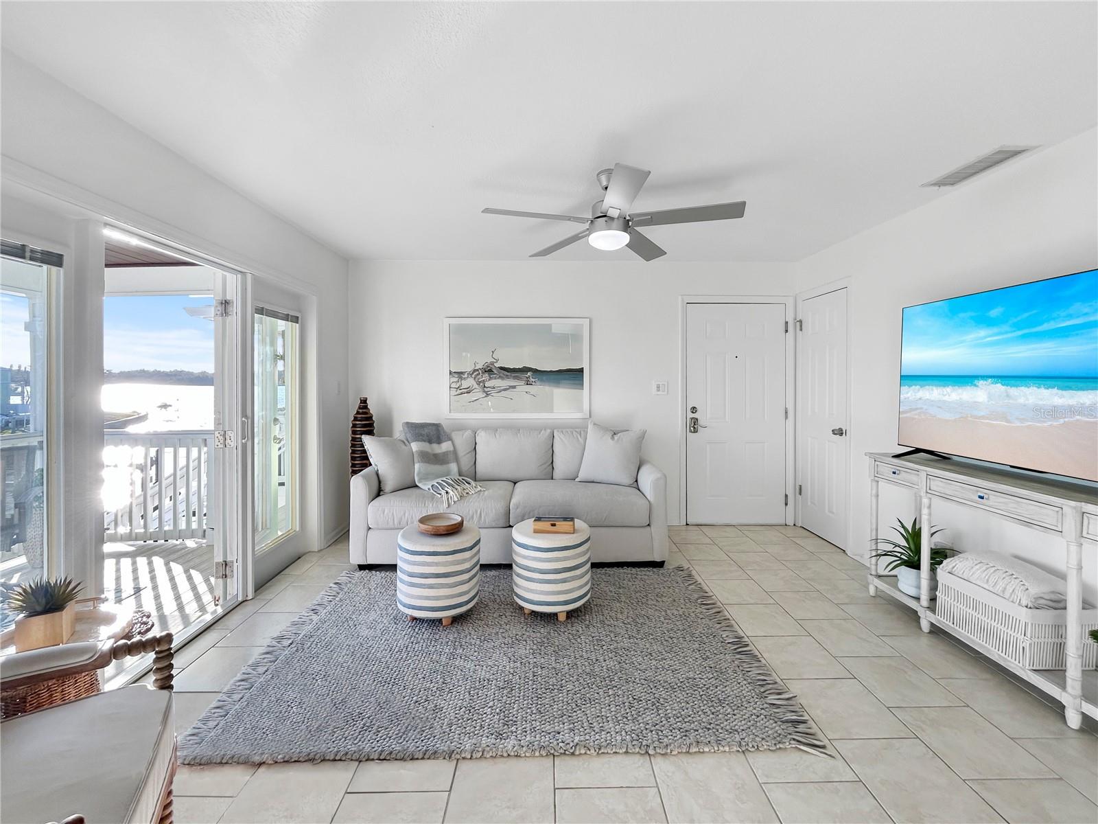 Living Room and balcony overlooking bay