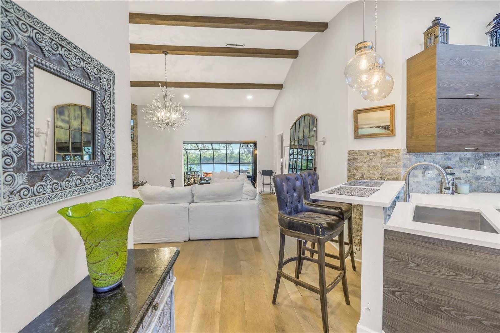 Entrance showing an open concept and view of the water