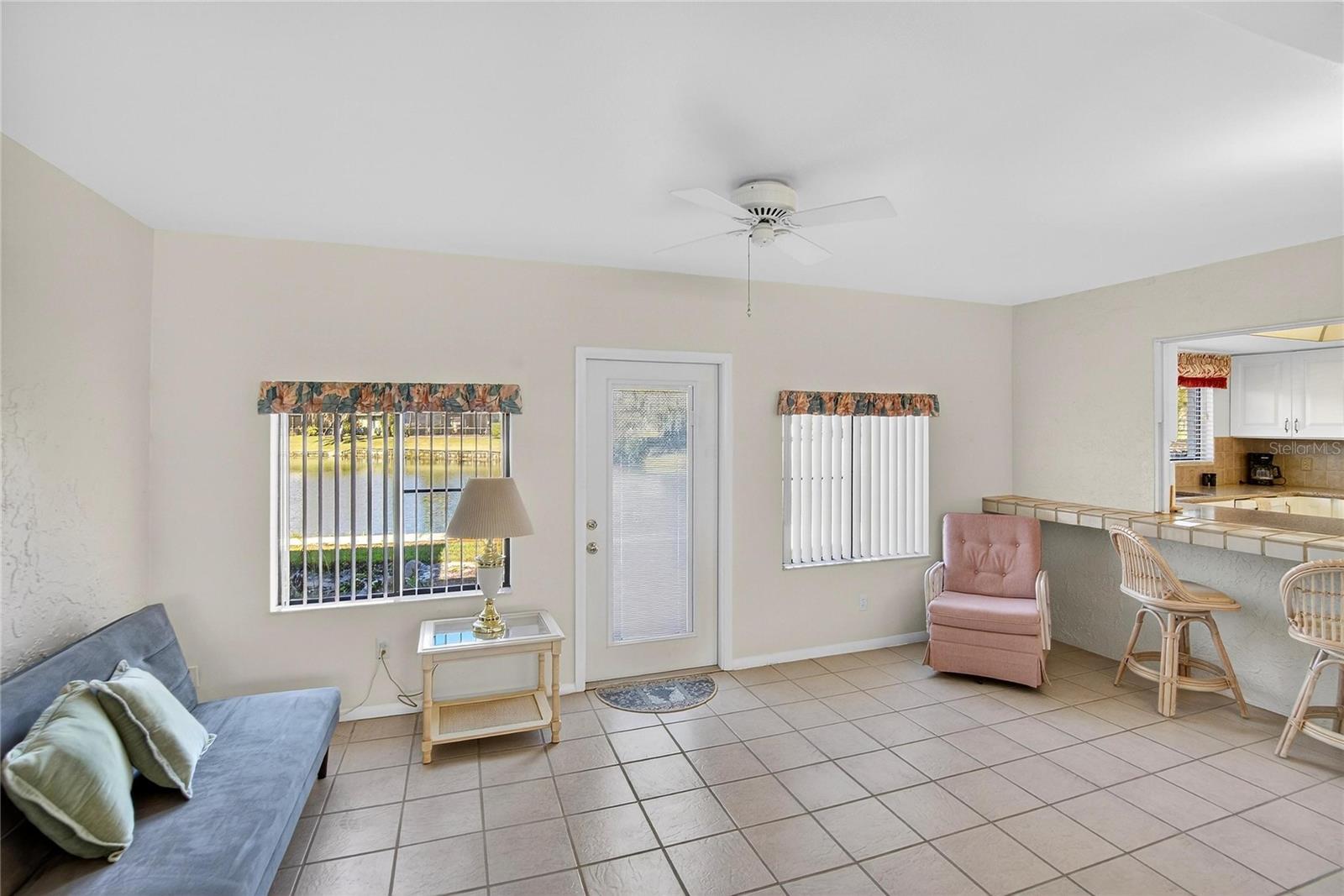 Bonus Room with POND view and pass through to kitchen