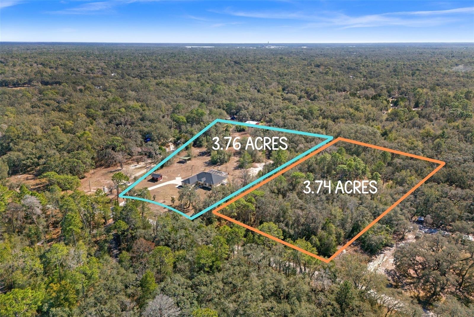 The lot that the house sits on and the available adjacent lot.