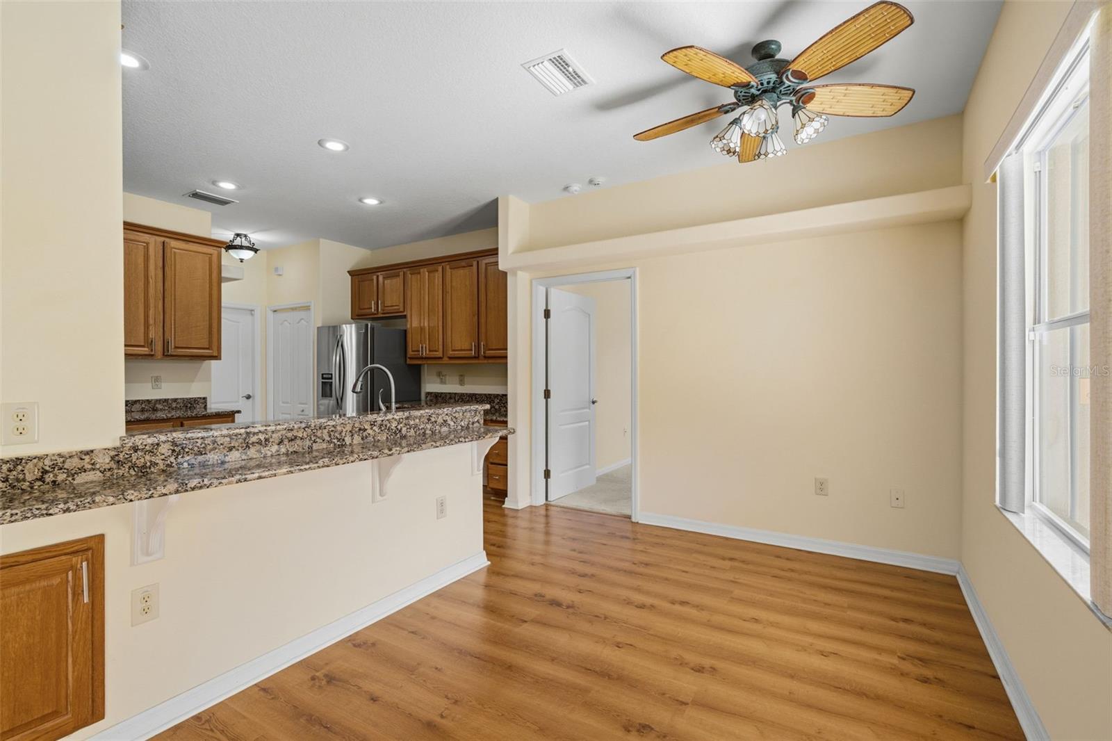 Informal Dining area overlooks the Pool deck.