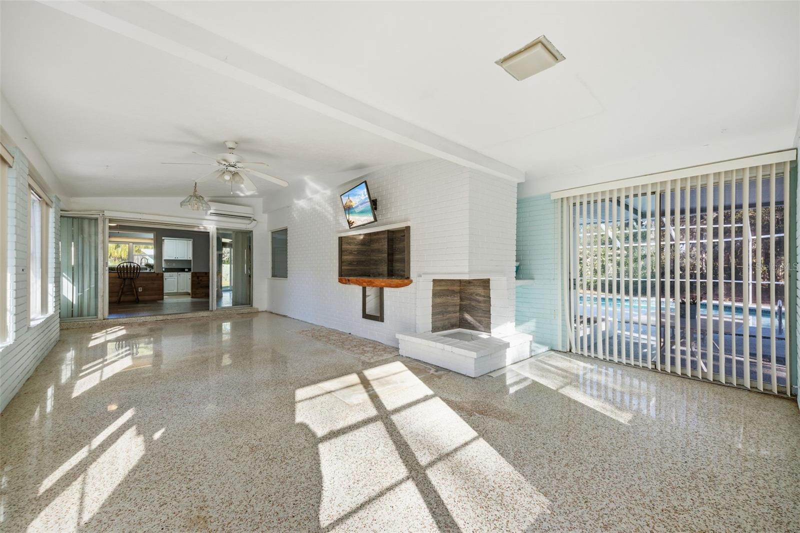 Bonus/game room with doors to exterior