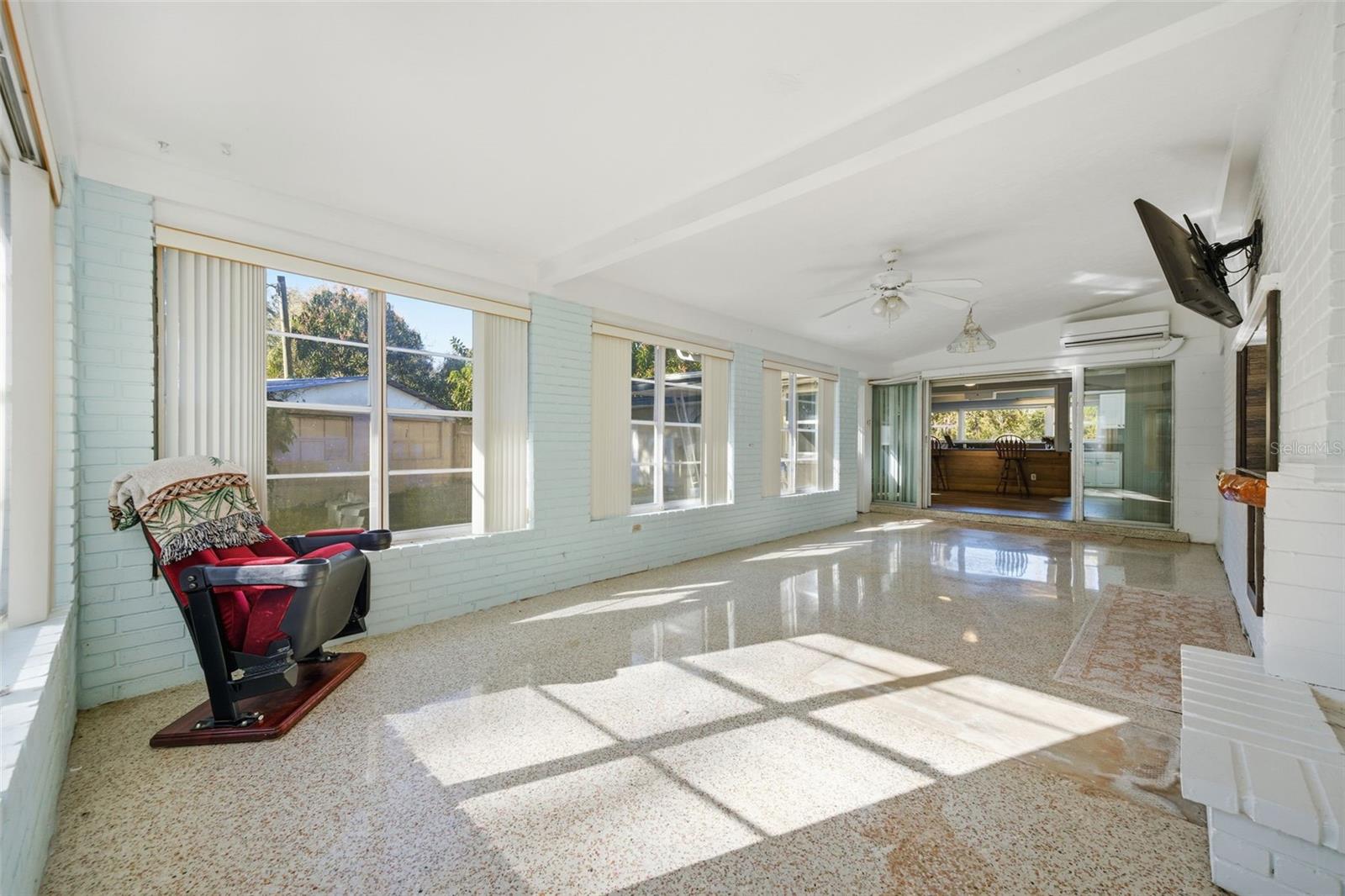 Bonus/game room with doors to exterior