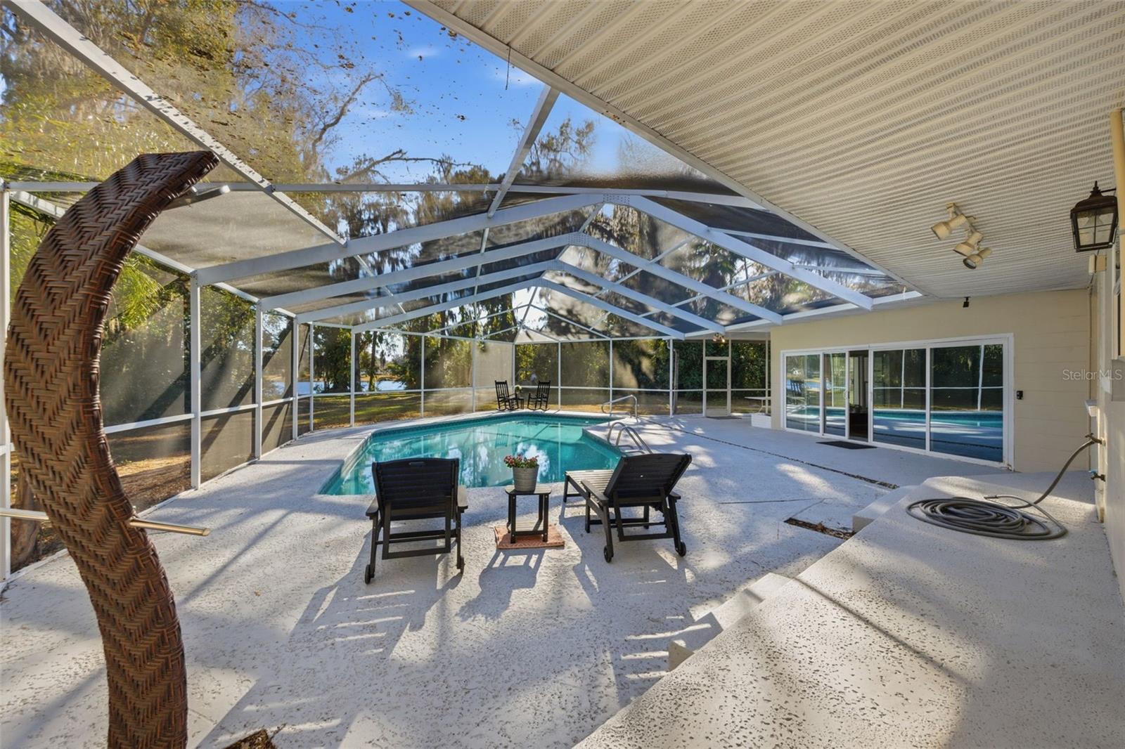 View of pool outside of master bedroom