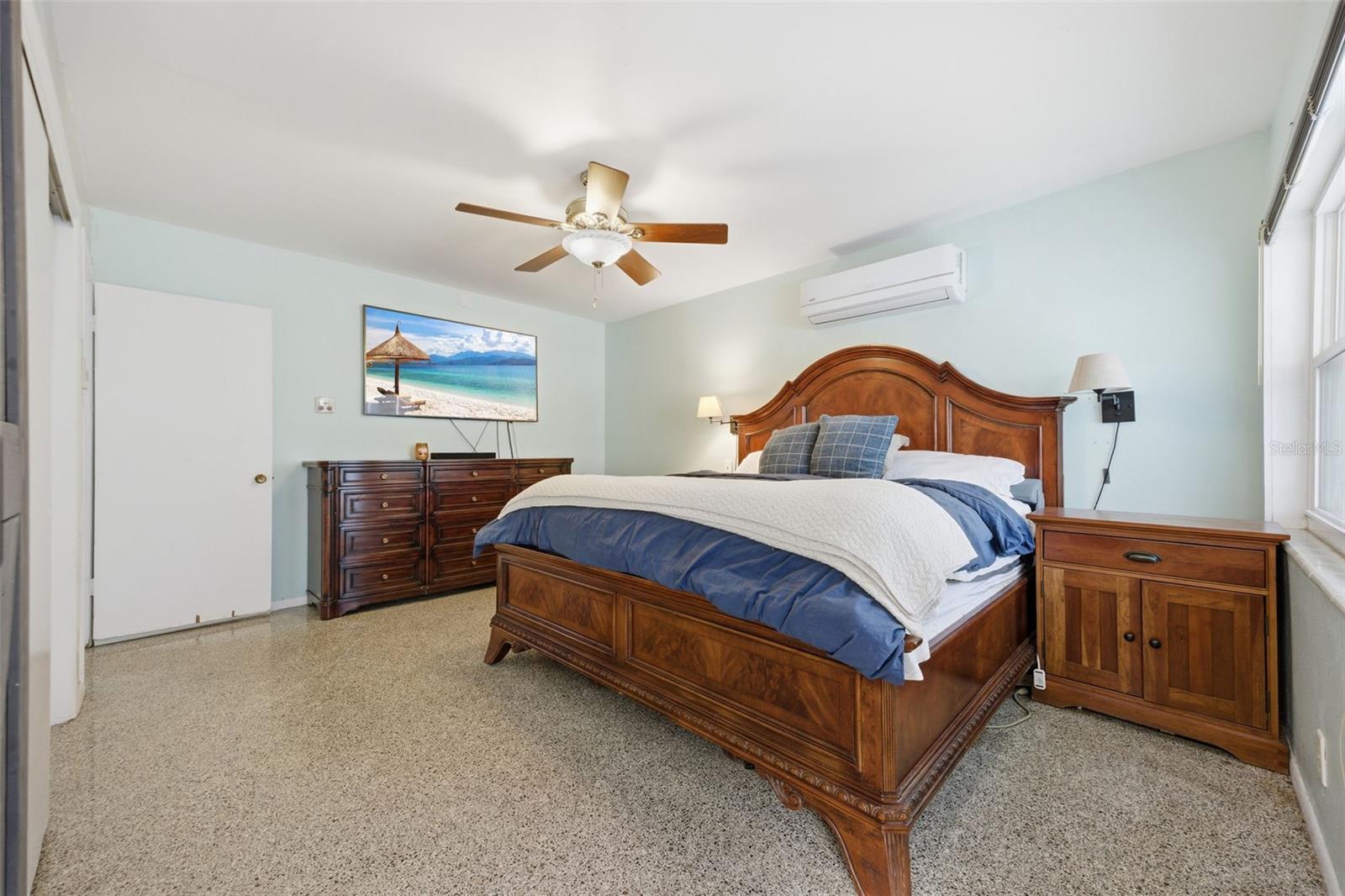 Primary Bedroom with door to pool deck