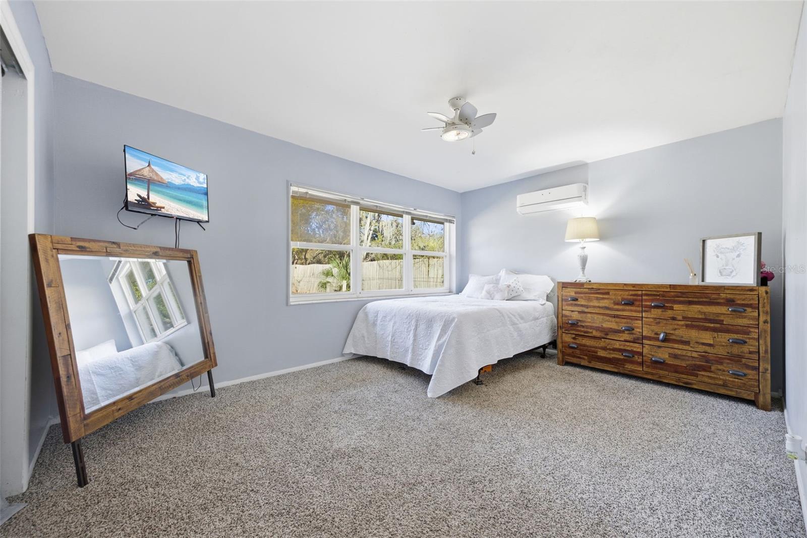 2nd bedroom with panoramic window facing front yard