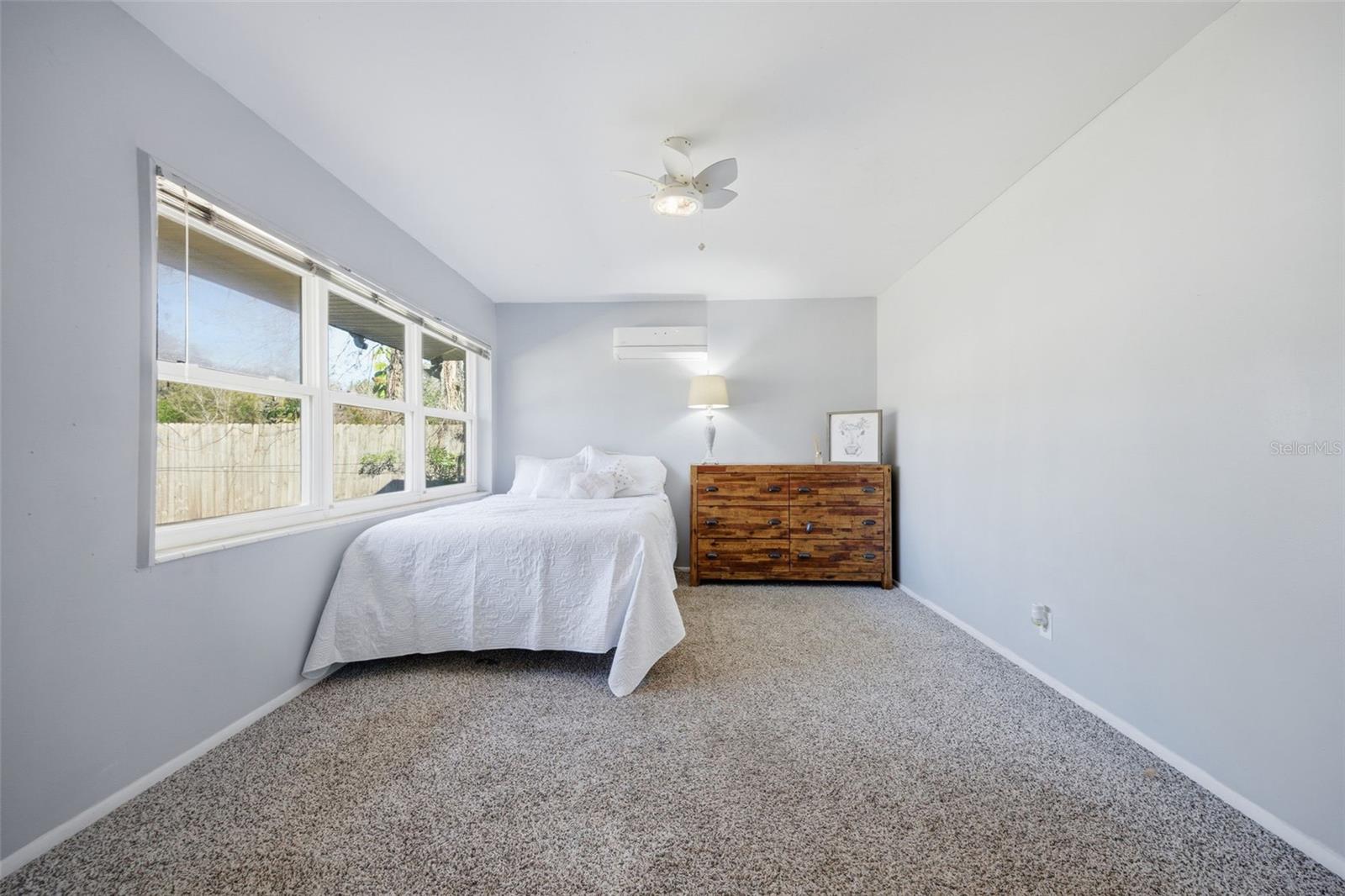 2nd bedroom with panoramic window facing front yard