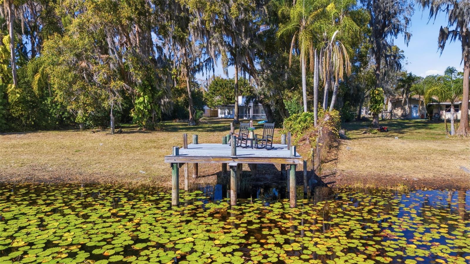 View of the dock and home from Lake Juanita