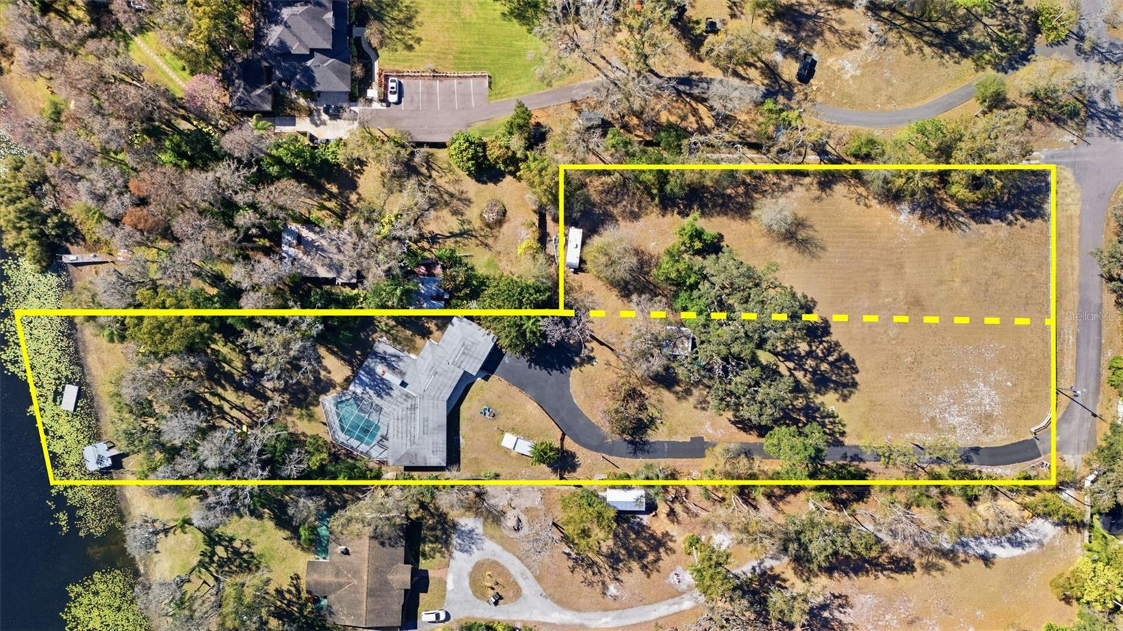 Areal view of home, 1.62 acres (long rectangle) additional .73 small rectangle with dotted line