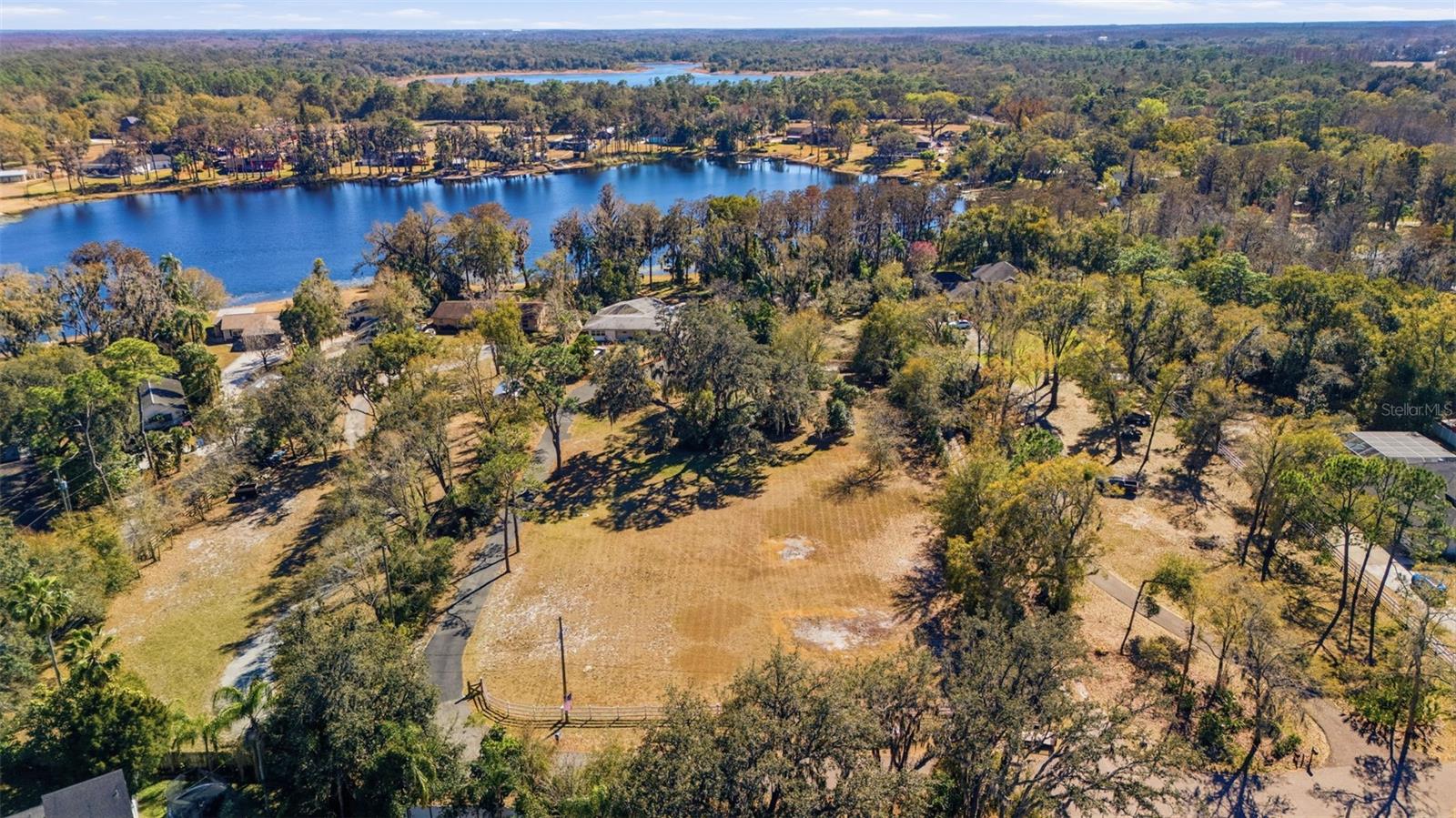 Aerial View including home and lake