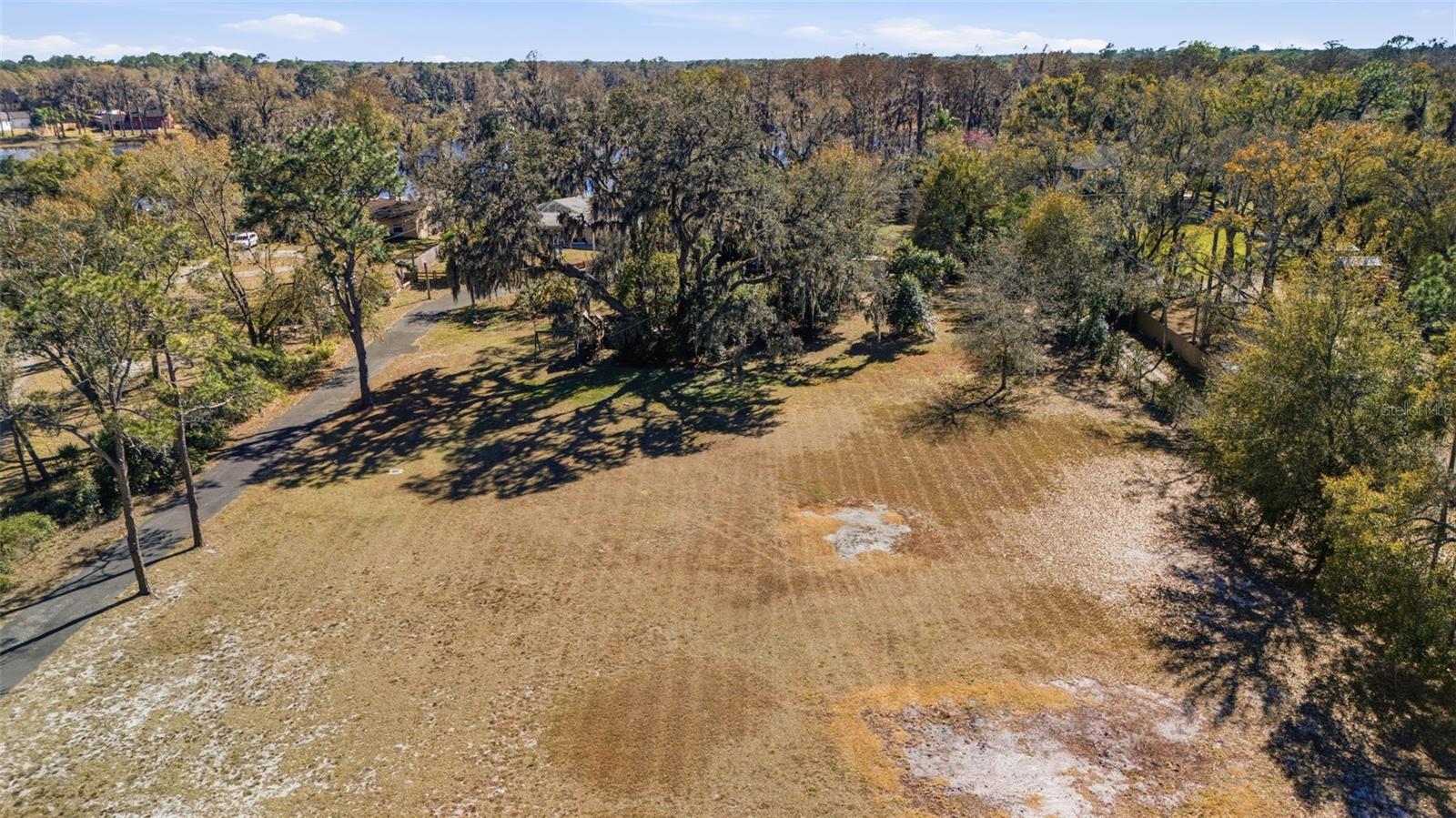 Aerial view of front of property and driveway....Imagine the possibilities