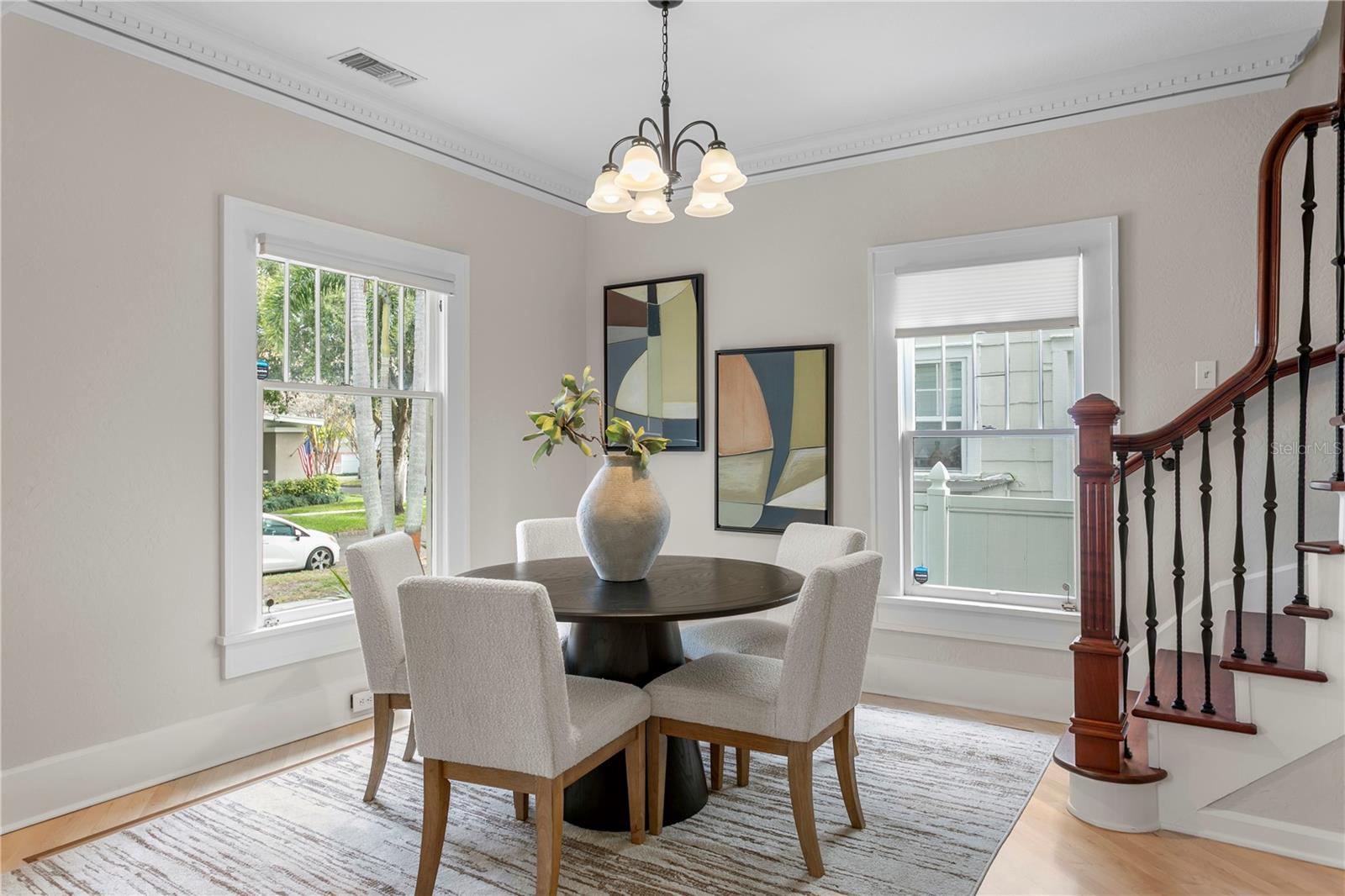 Dining area with beautiful staircase
