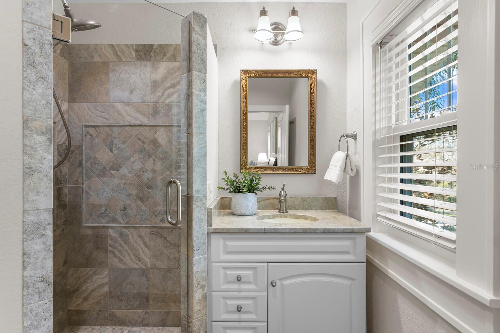 Full bathroom for second upstairs suite