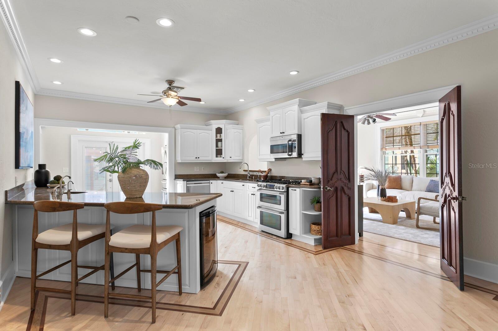 Large open kitchen with breakfast counter