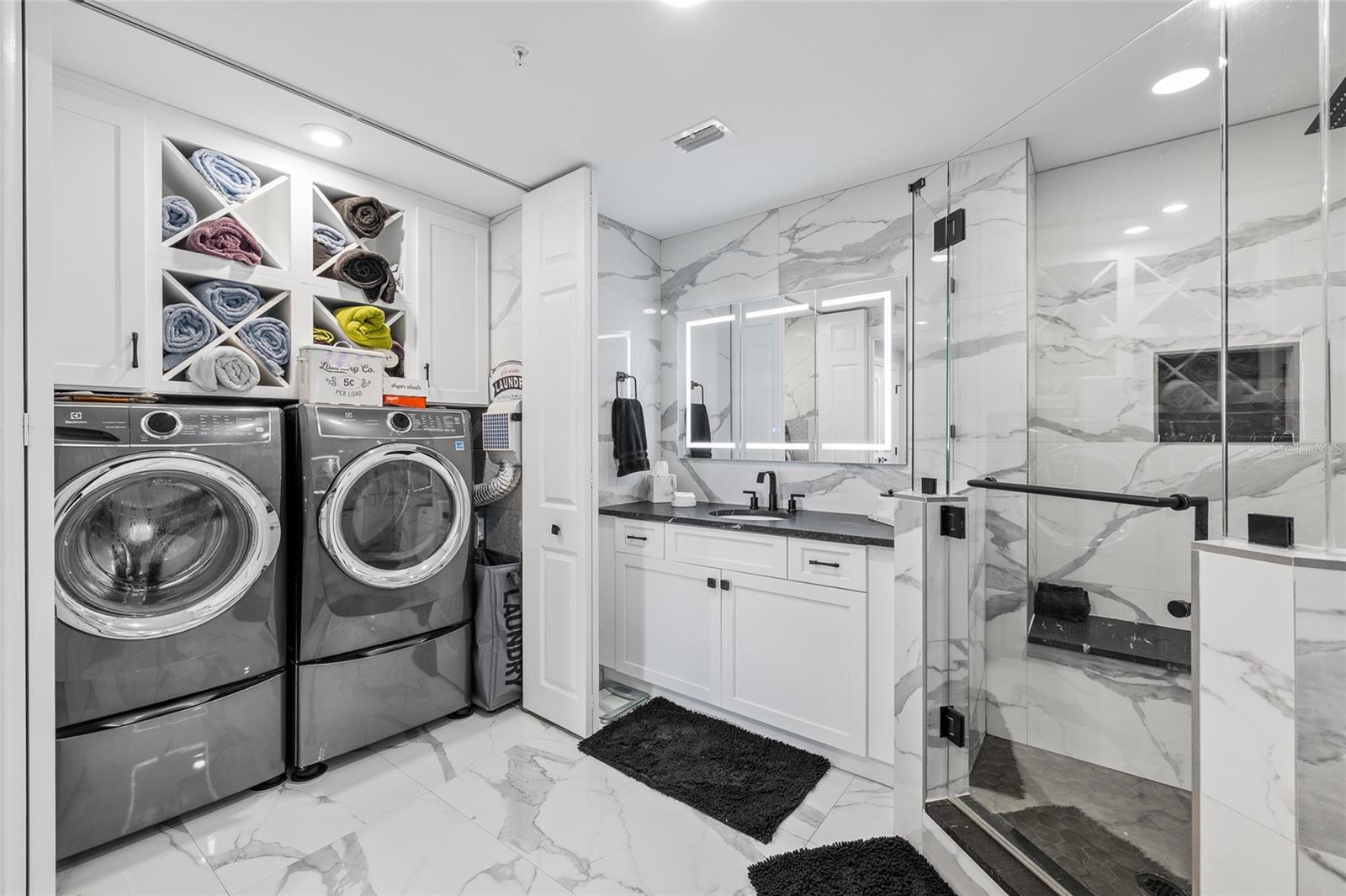 Laundry inside of primary bathroom