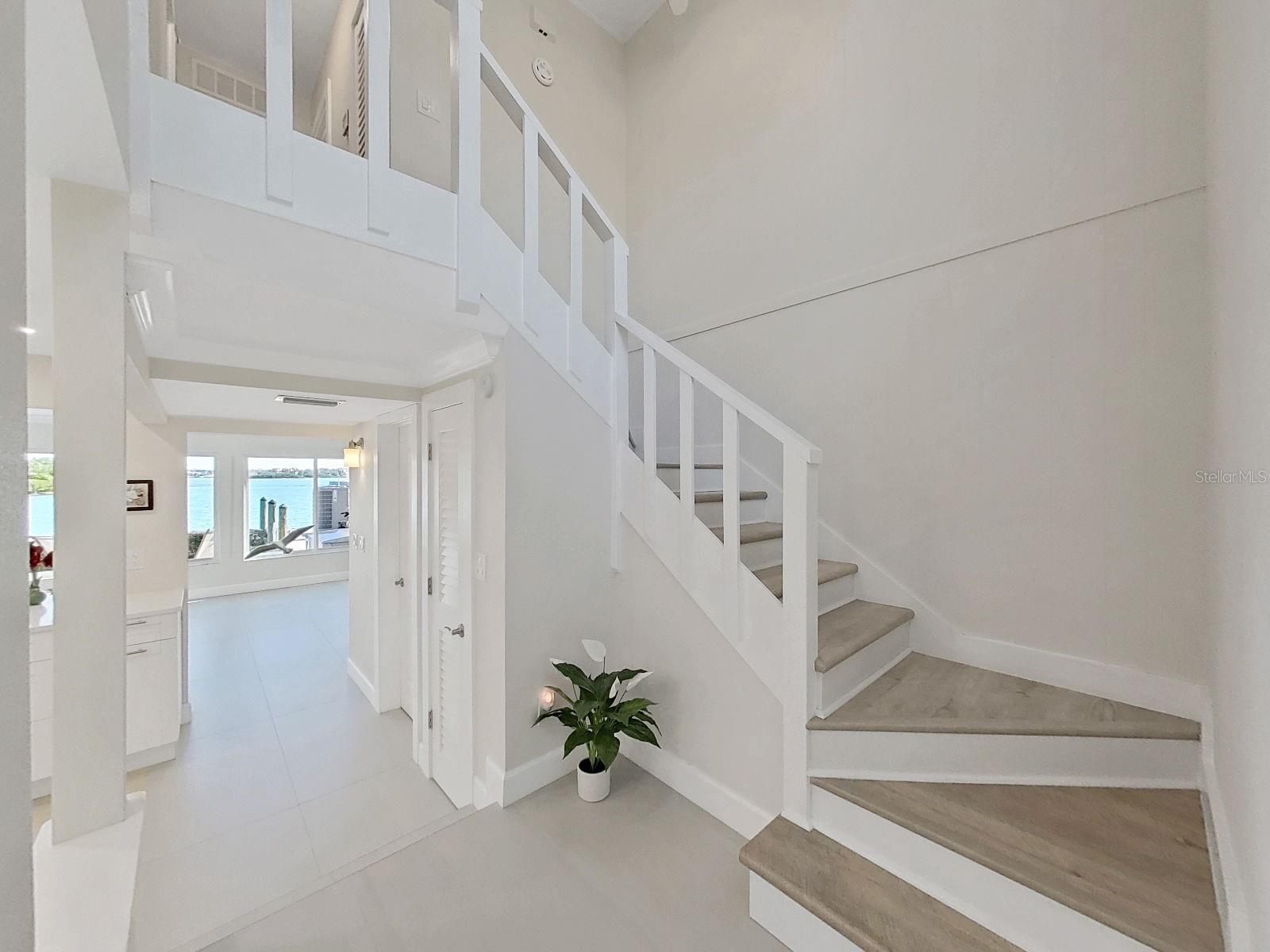 Experience the open floor plan as soon as you step into the foyer and breath taking water views.