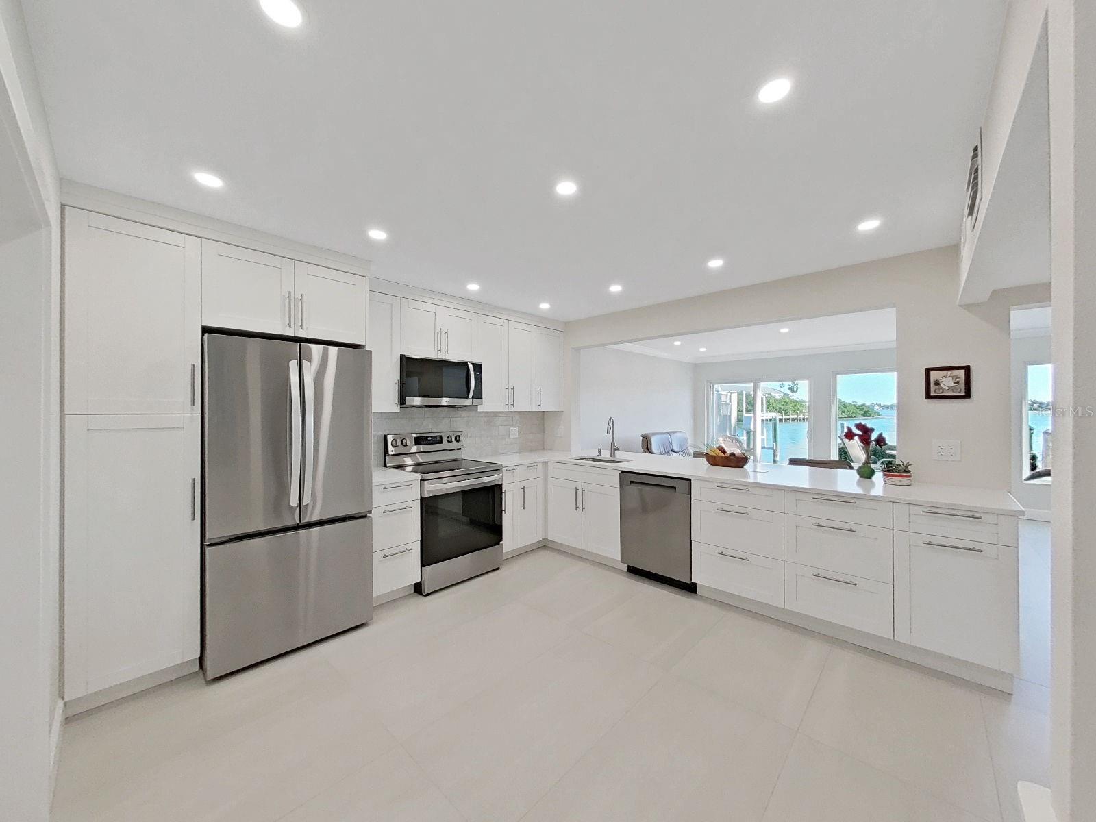 All new appliances (2025) French door refrigerator, cabinet pantry, pull out kitchen faucet, Quartz countertops,